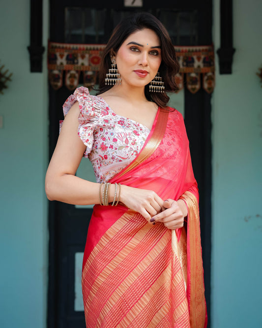 Vibrant Coral Pink Plain Chiffon Saree with Gold Zari Border, Floral Ruffled Blouse & Tassel Detailing - SEEANS