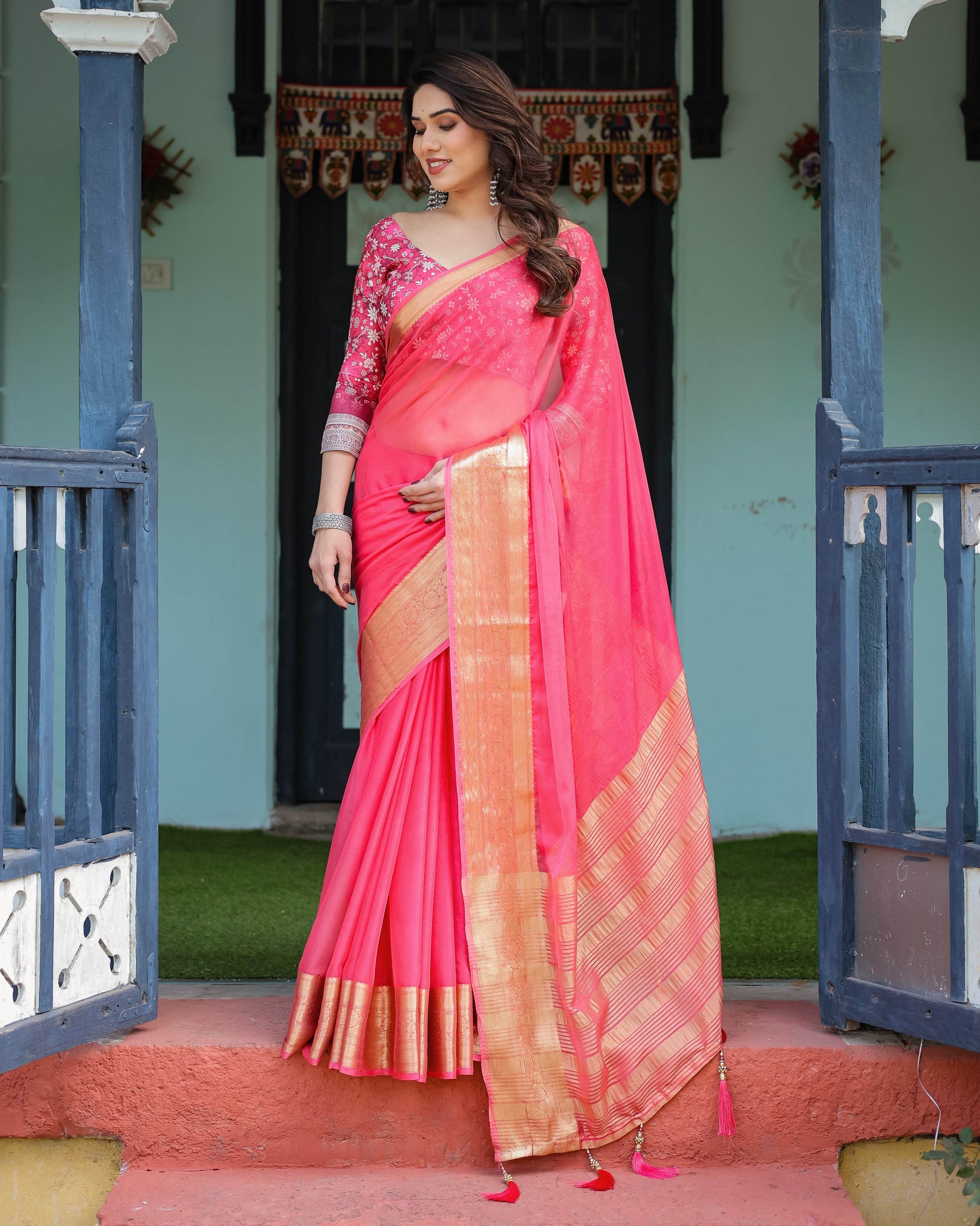 Ravishing Rani Pink Plain Chiffon Saree with Gold Zari Border, Floral Printed Blouse & Tassel Accents - SEEANS