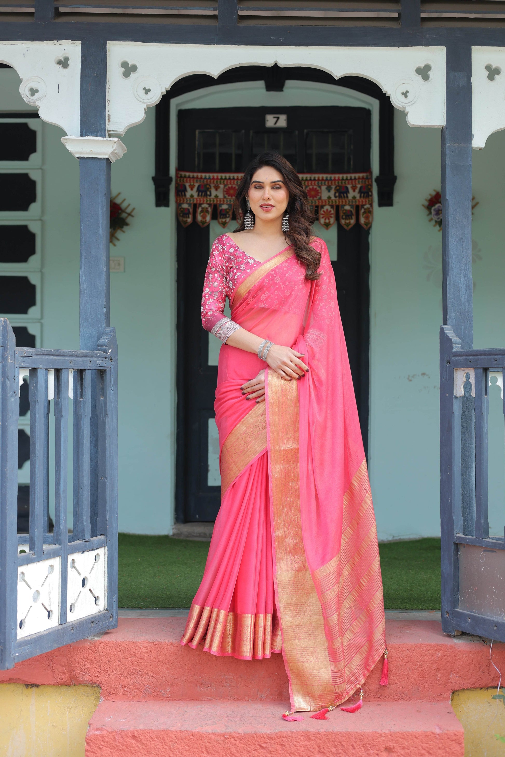 Ravishing Rani Pink Plain Chiffon Saree with Gold Zari Border, Floral Printed Blouse & Tassel Accents - SEEANS