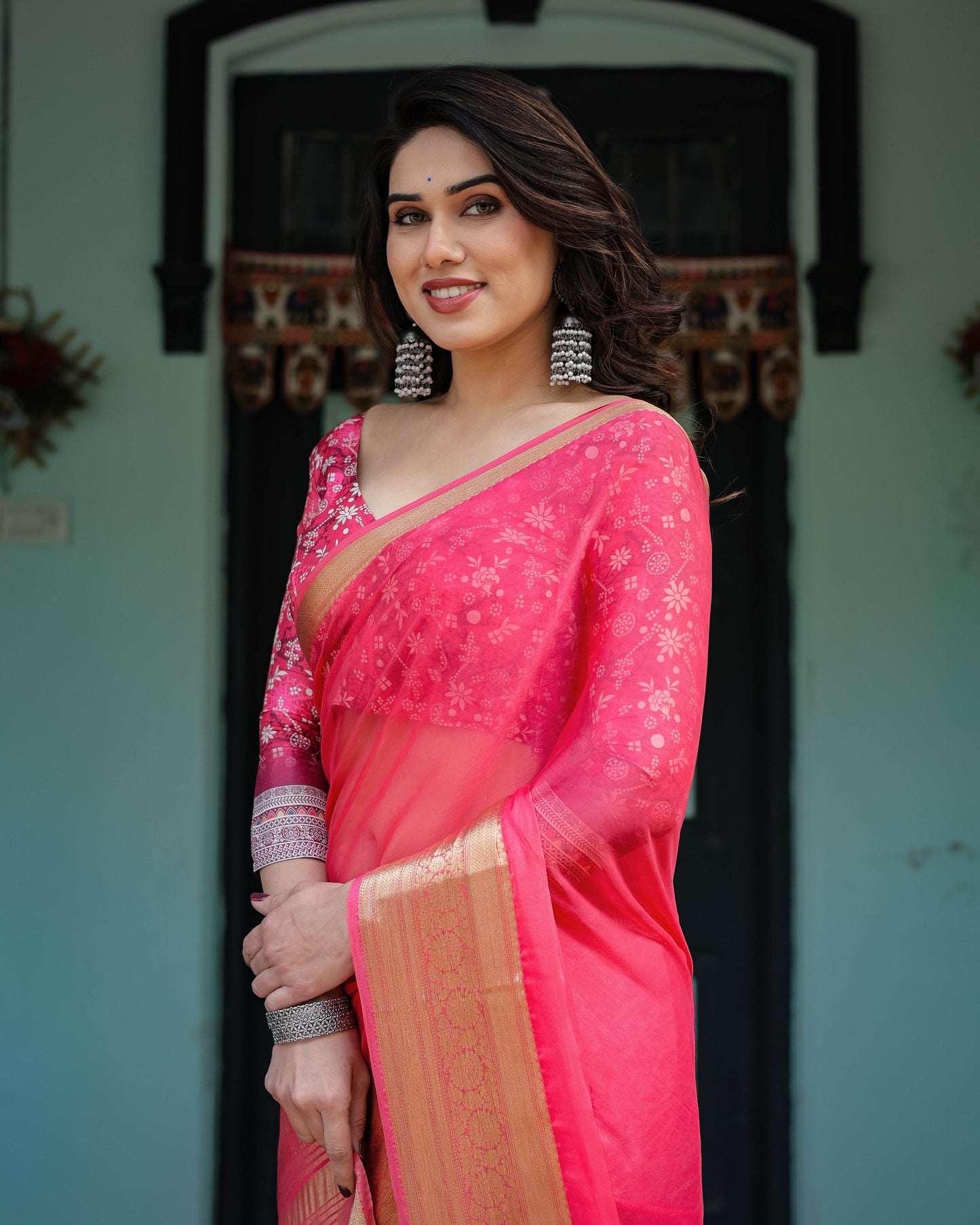 Ravishing Rani Pink Plain Chiffon Saree with Gold Zari Border, Floral Printed Blouse & Tassel Accents - SEEANS