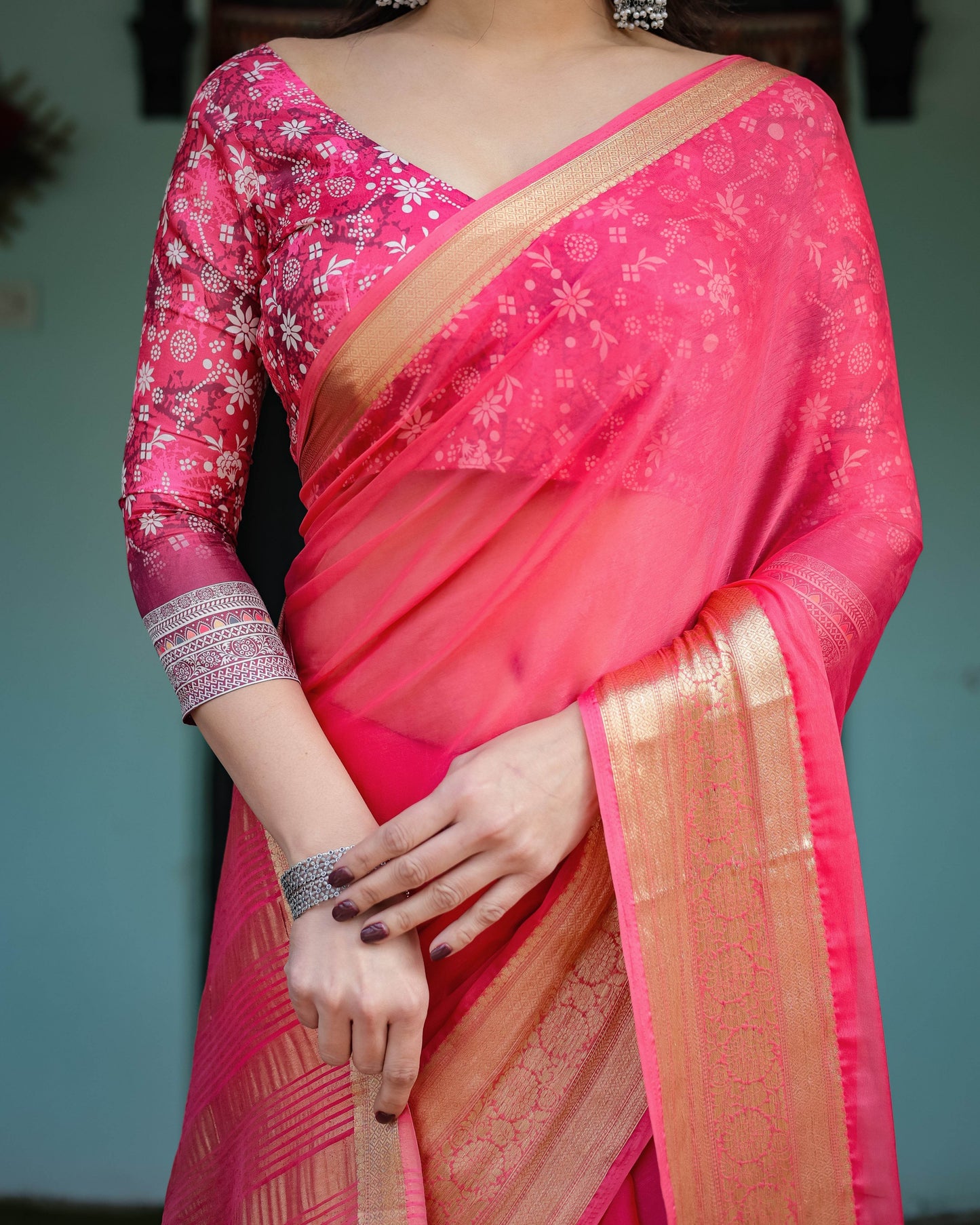 Ravishing Rani Pink Plain Chiffon Saree with Gold Zari Border, Floral Printed Blouse & Tassel Accents - SEEANS