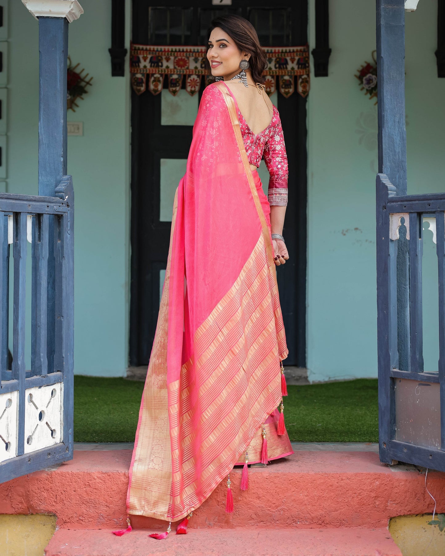 Ravishing Rani Pink Plain Chiffon Saree with Gold Zari Border, Floral Printed Blouse & Tassel Accents - SEEANS