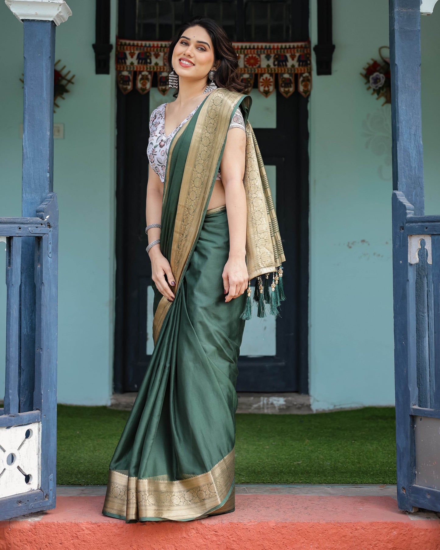 Elegant Bottle Green Plain Chiffon Saree with Gold Zari Border, Floral Printed Blouse & Tassel Finishing - SEEANS