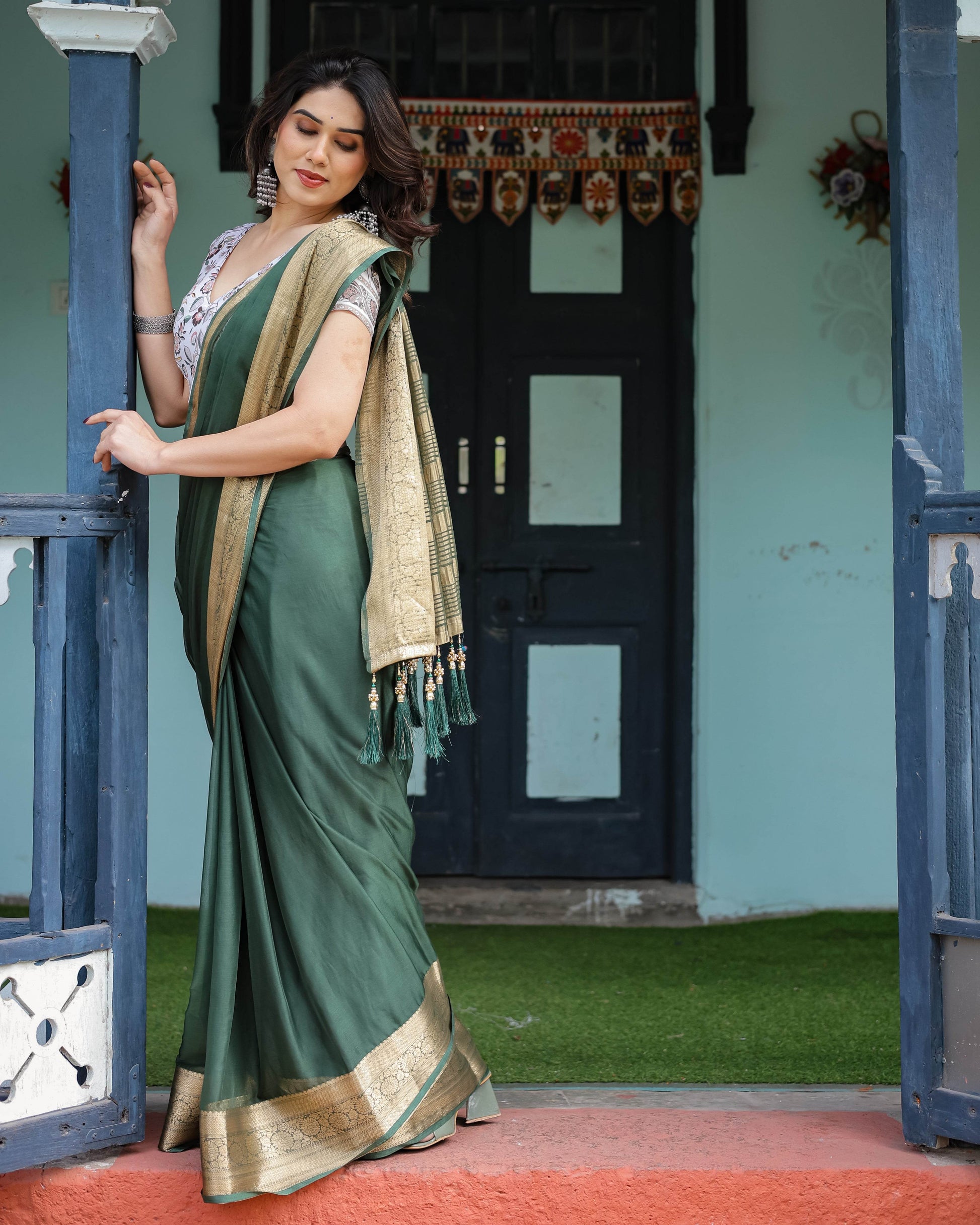 Elegant Bottle Green Plain Chiffon Saree with Gold Zari Border, Floral Printed Blouse & Tassel Finishing - SEEANS