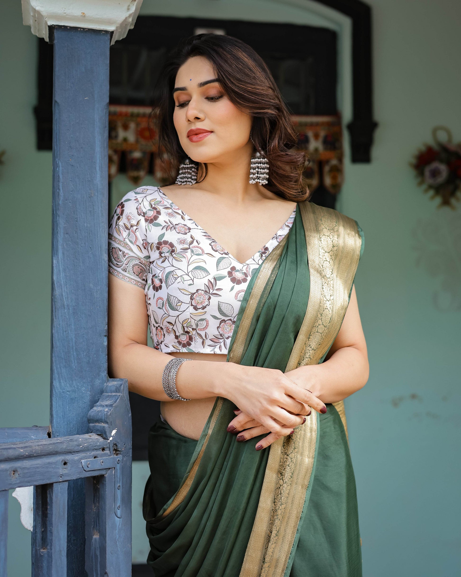 Elegant Bottle Green Plain Chiffon Saree with Gold Zari Border, Floral Printed Blouse & Tassel Finishing - SEEANS