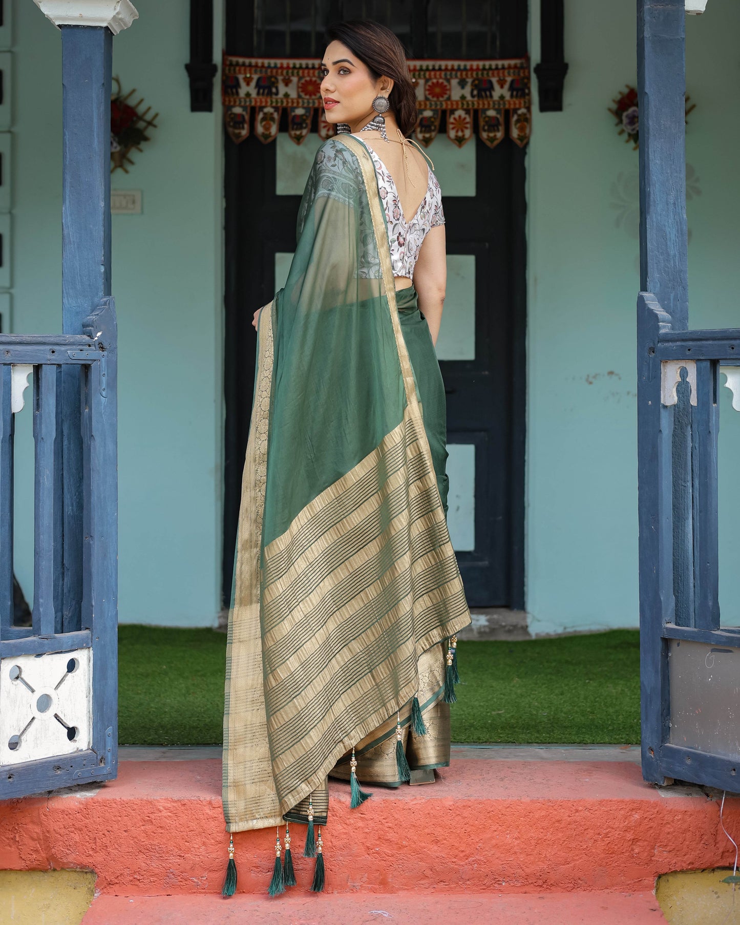 Elegant Bottle Green Plain Chiffon Saree with Gold Zari Border, Floral Printed Blouse & Tassel Finishing - SEEANS