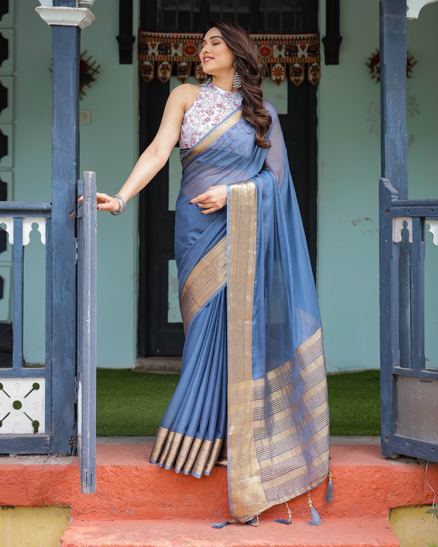 Serene Steel Blue Plain Chiffon Saree with Gold Zari Border, Floral Printed Blouse & Tassel Detailing - SEEANS