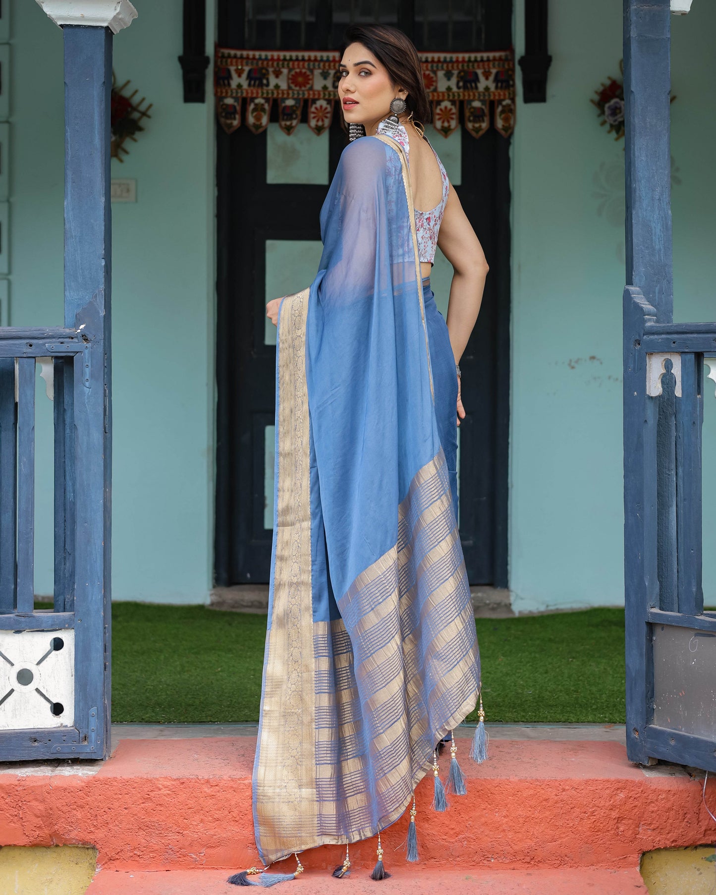 Serene Steel Blue Plain Chiffon Saree with Gold Zari Border, Floral Printed Blouse & Tassel Detailing - SEEANS