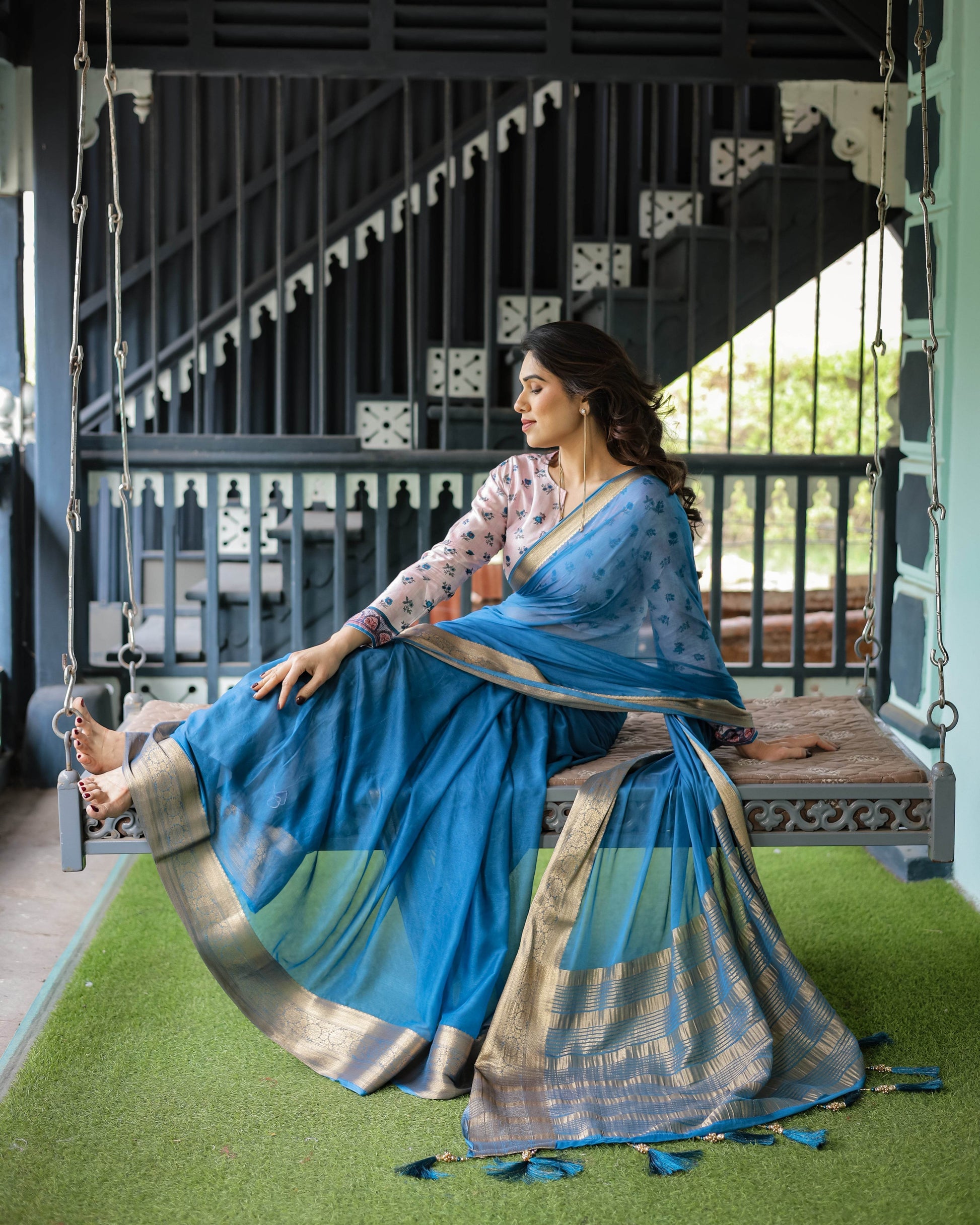 Vibrant Sky Blue Plain Chiffon Saree with Gold Zari Border, Floral Printed Blouse & Tassel Accents - SEEANS