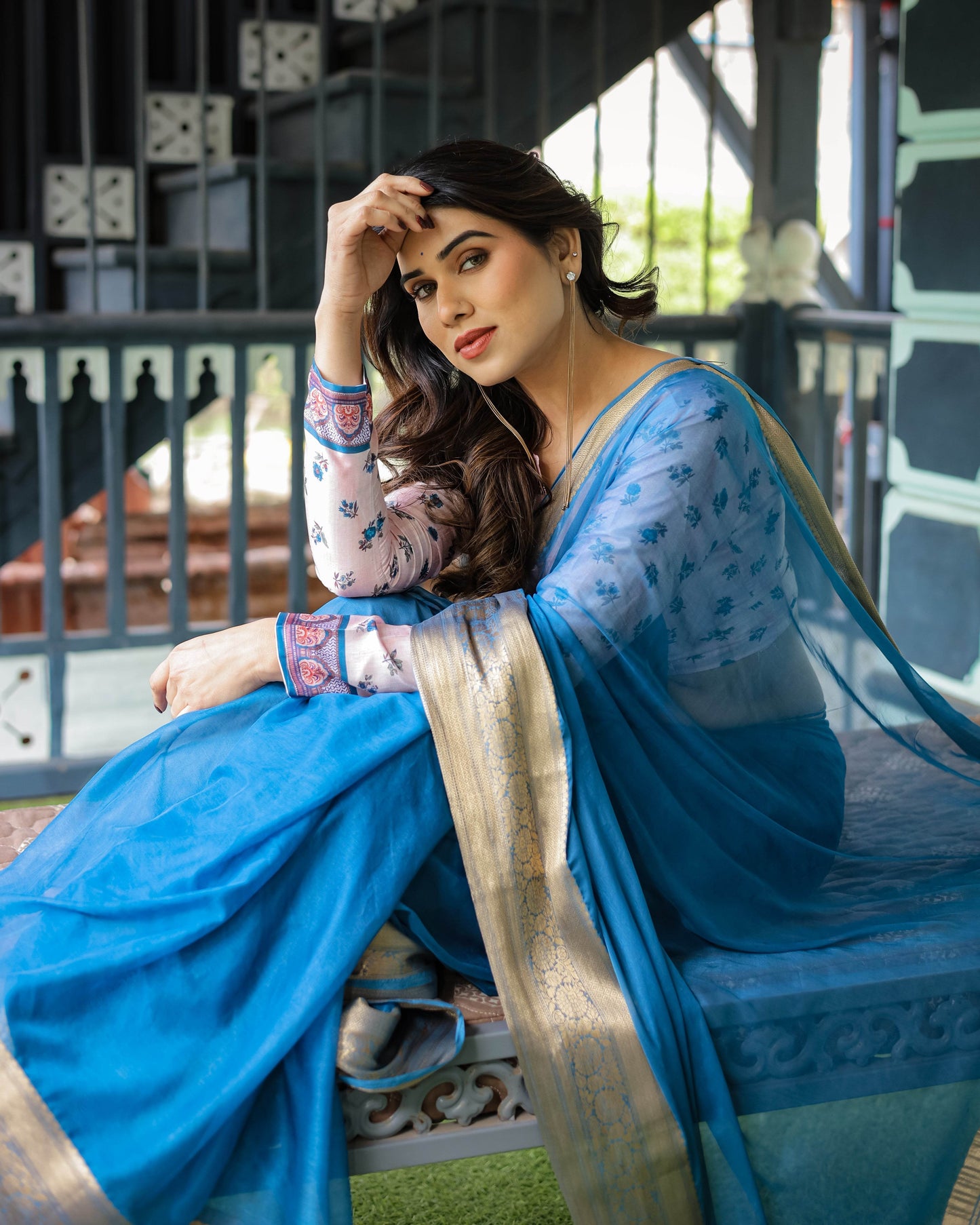 Vibrant Sky Blue Plain Chiffon Saree with Gold Zari Border, Floral Printed Blouse & Tassel Accents - SEEANS