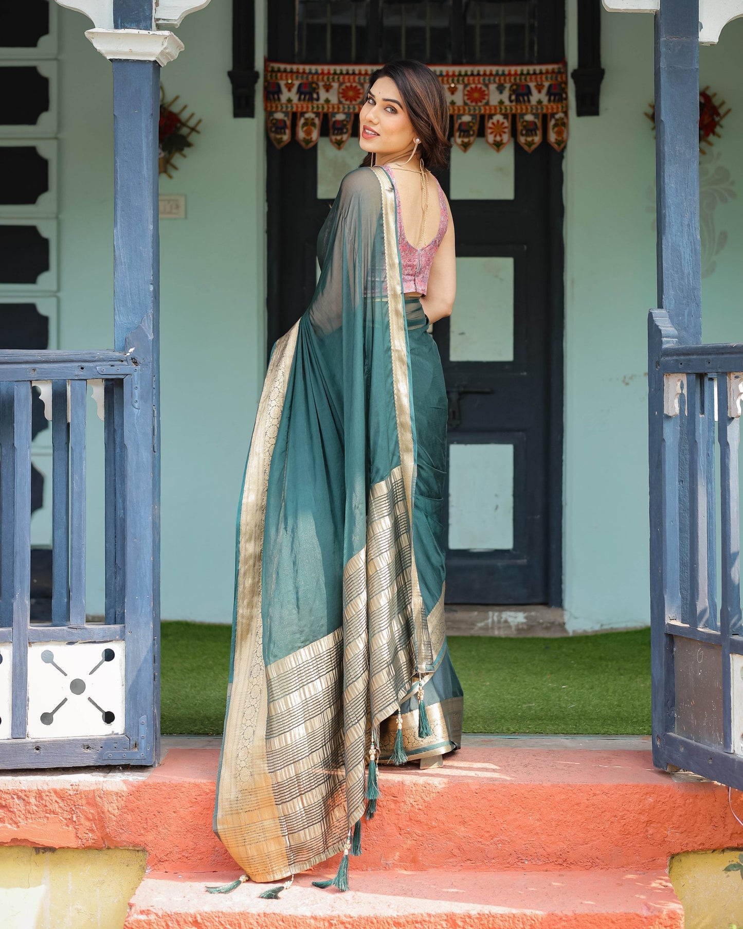 Enchanting Forest Green Plain Chiffon Saree with Gold Zari Border, Floral Printed Blouse & Tassel Details - SEEANS