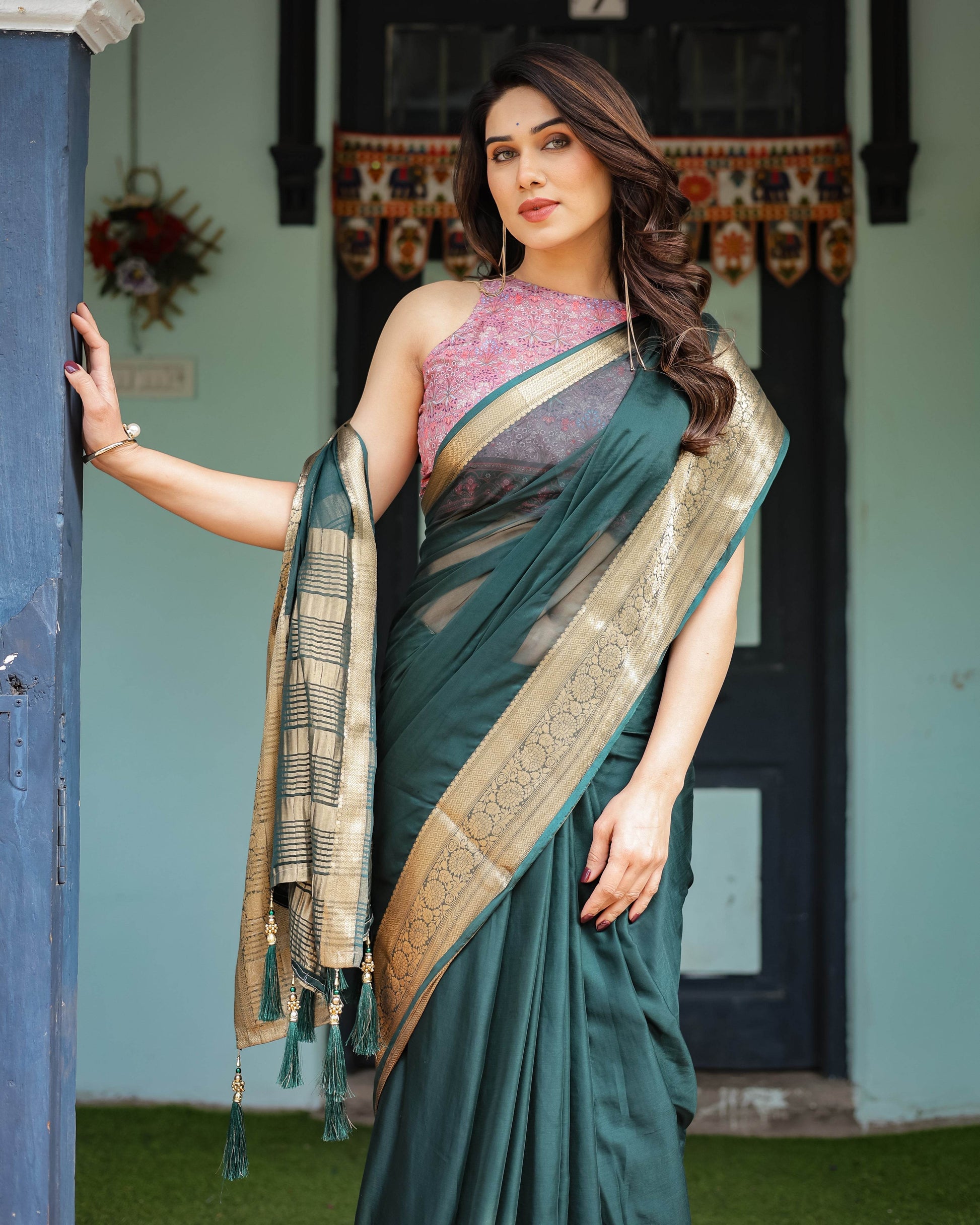 Enchanting Forest Green Plain Chiffon Saree with Gold Zari Border, Floral Printed Blouse & Tassel Details - SEEANS