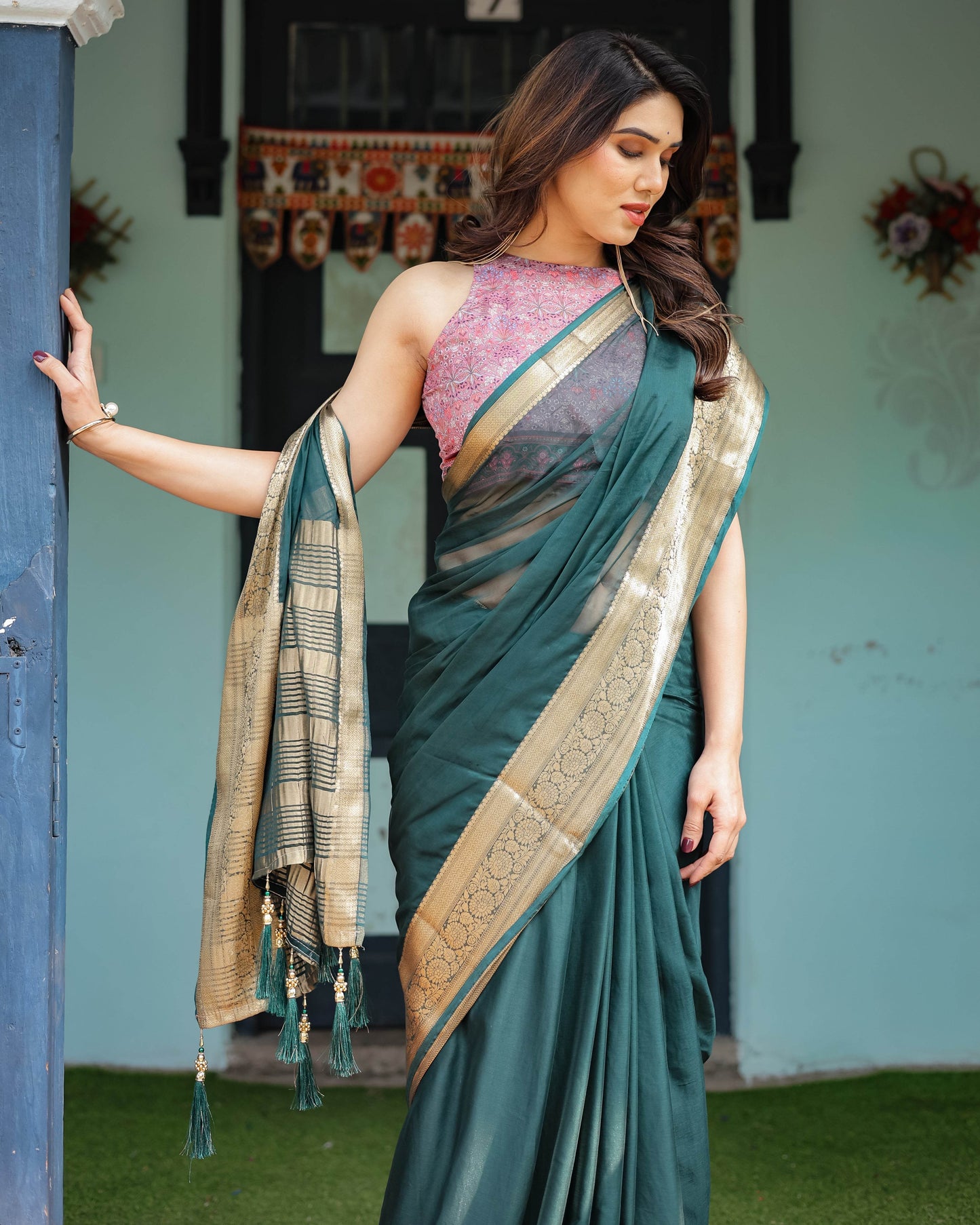 Enchanting Forest Green Plain Chiffon Saree with Gold Zari Border, Floral Printed Blouse & Tassel Details - SEEANS