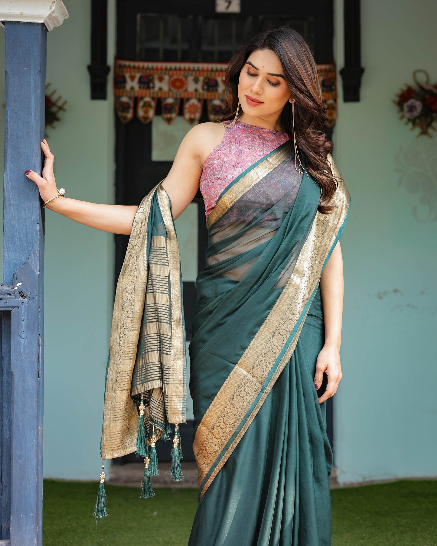 Enchanting Forest Green Plain Chiffon Saree with Gold Zari Border, Floral Printed Blouse & Tassel Details - SEEANS