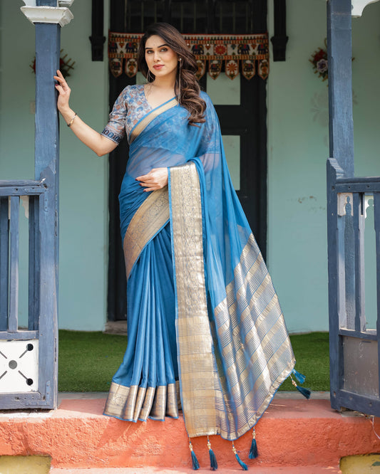 Vibrant Peacock Blue Plain Chiffon Saree with Gold Zari Border, Floral Printed Blouse & Tassel Accents - SEEANS