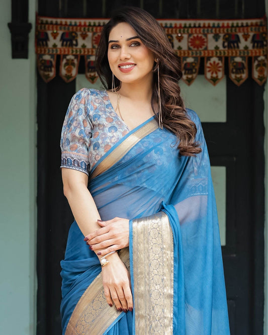 Vibrant Peacock Blue Plain Chiffon Saree with Gold Zari Border, Floral Printed Blouse & Tassel Accents - SEEANS