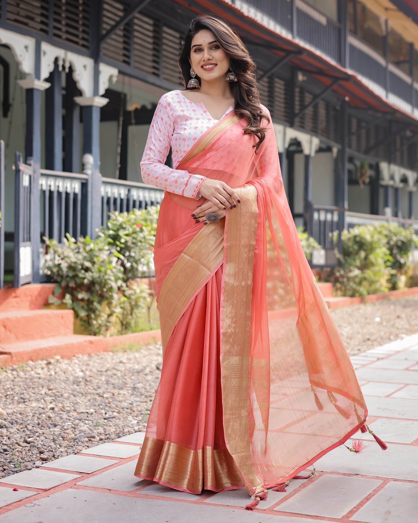 Peach Pink Plain Chiffon Saree with Gold Zari Border, Geometric Printed Blouse & Tassel Detailing - SEEANS