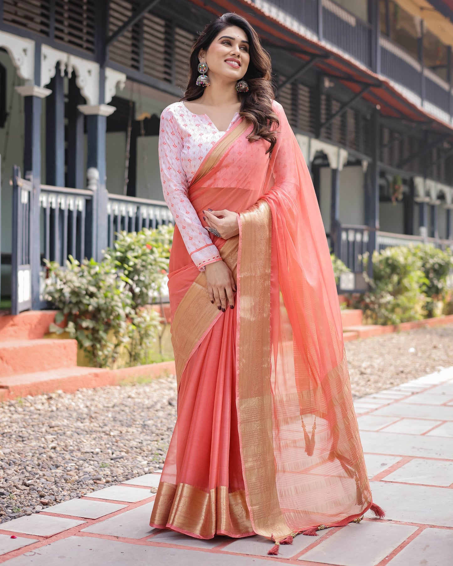 Peach Pink Plain Chiffon Saree with Gold Zari Border, Geometric Printed Blouse & Tassel Detailing - SEEANS