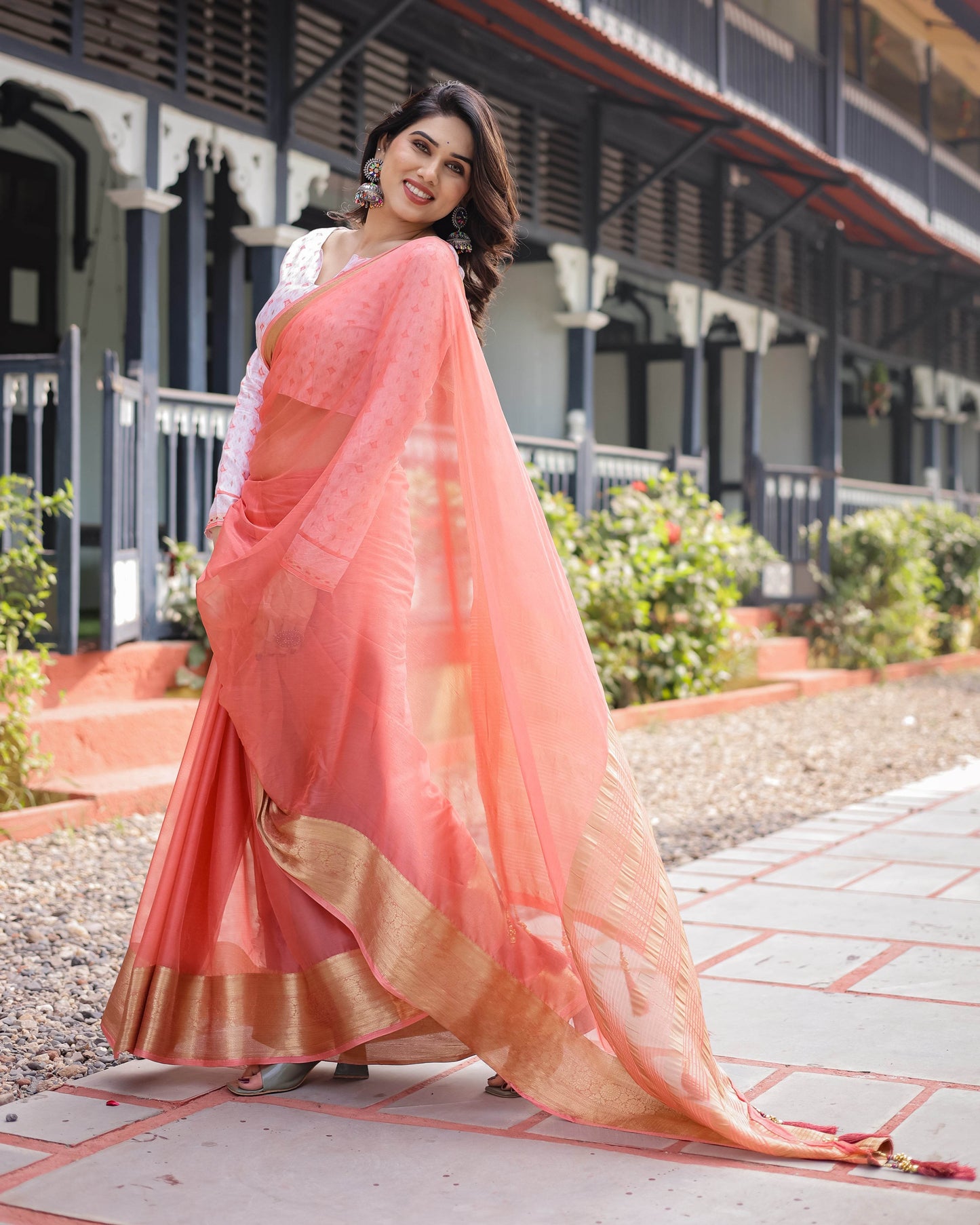 Peach Pink Plain Chiffon Saree with Gold Zari Border, Geometric Printed Blouse & Tassel Detailing - SEEANS