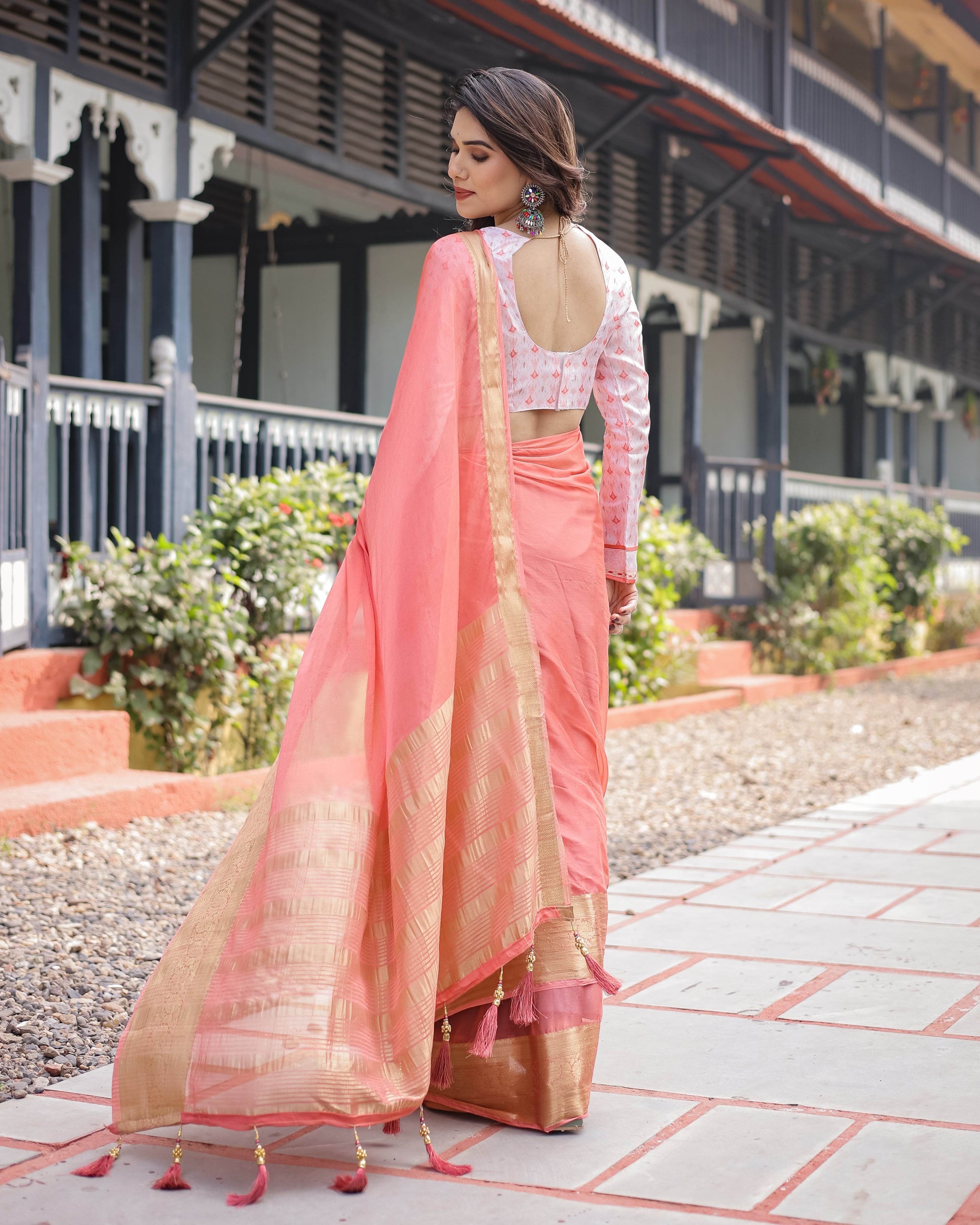 Peach Pink Plain Chiffon Saree with Gold Zari Border, Geometric Printed Blouse & Tassel Detailing - SEEANS