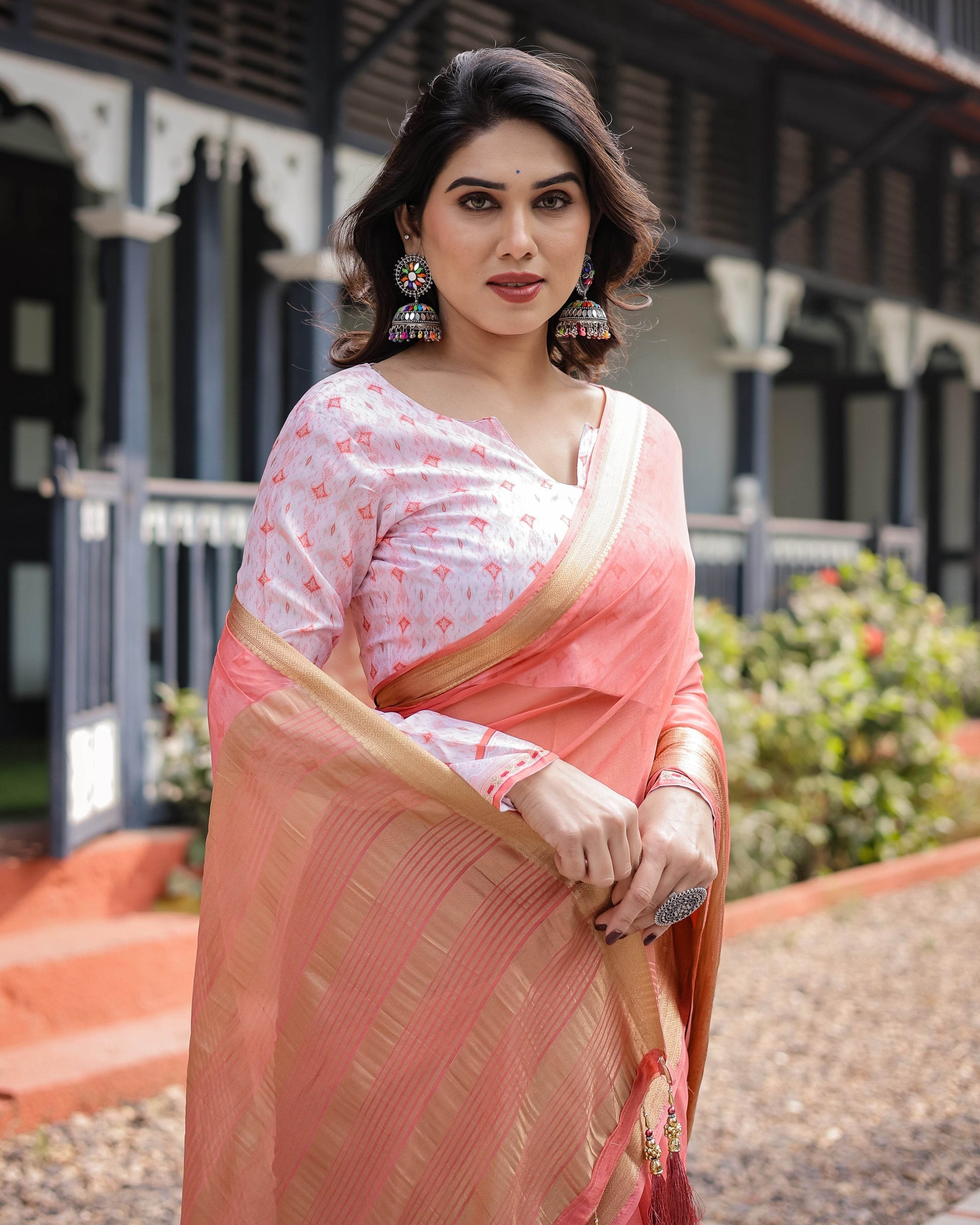 Peach Pink Plain Chiffon Saree with Gold Zari Border, Geometric Printed Blouse & Tassel Detailing - SEEANS