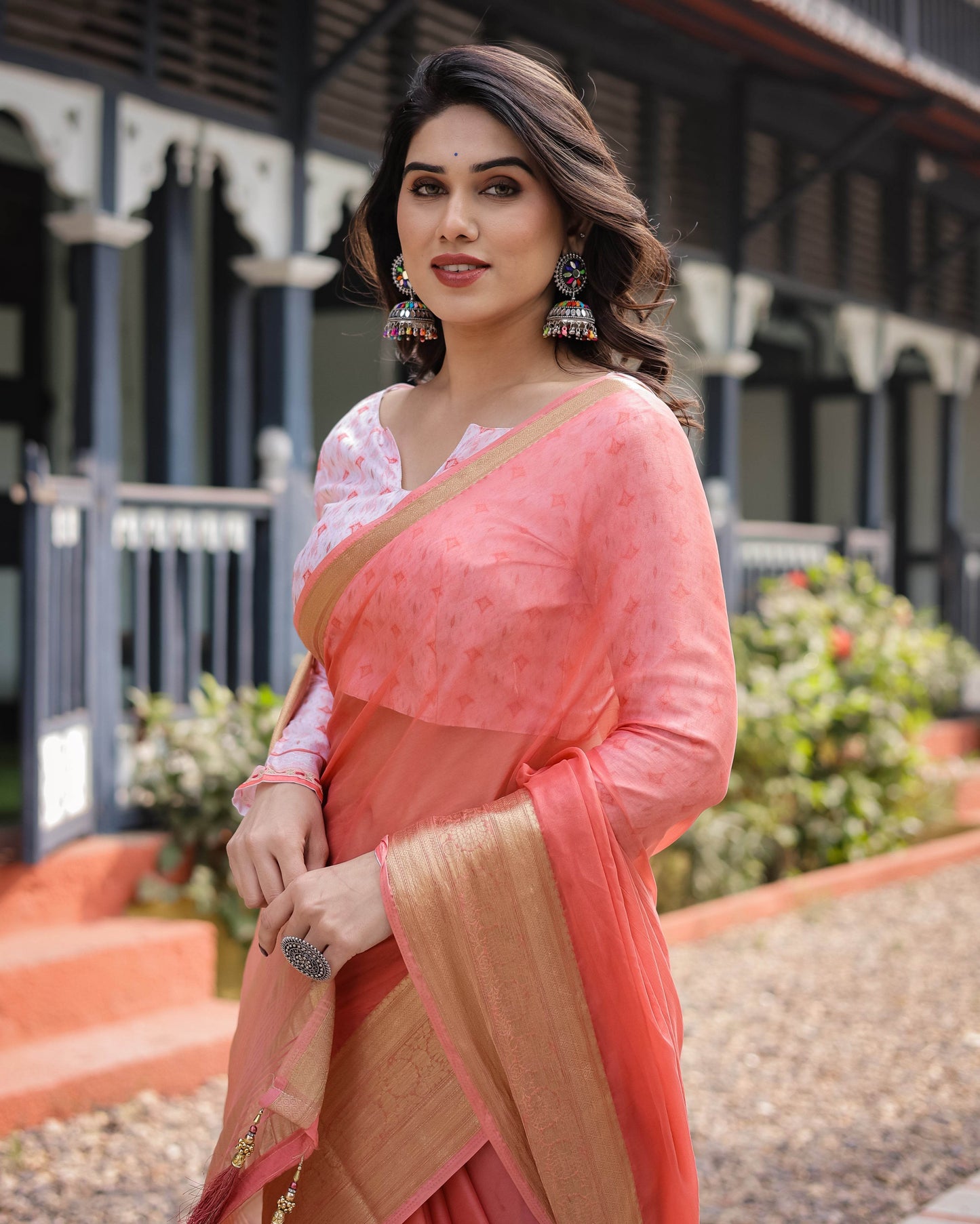 Peach Pink Plain Chiffon Saree with Gold Zari Border, Geometric Printed Blouse & Tassel Detailing - SEEANS