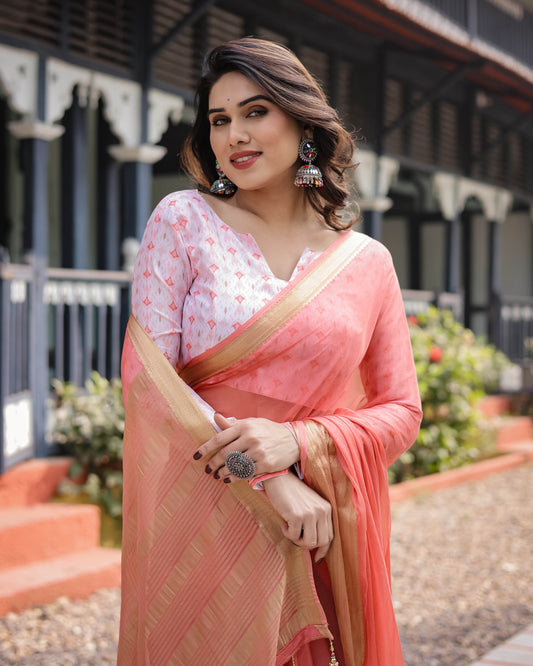 Peach Pink Plain Chiffon Saree with Gold Zari Border, Geometric Printed Blouse & Tassel Detailing - SEEANS