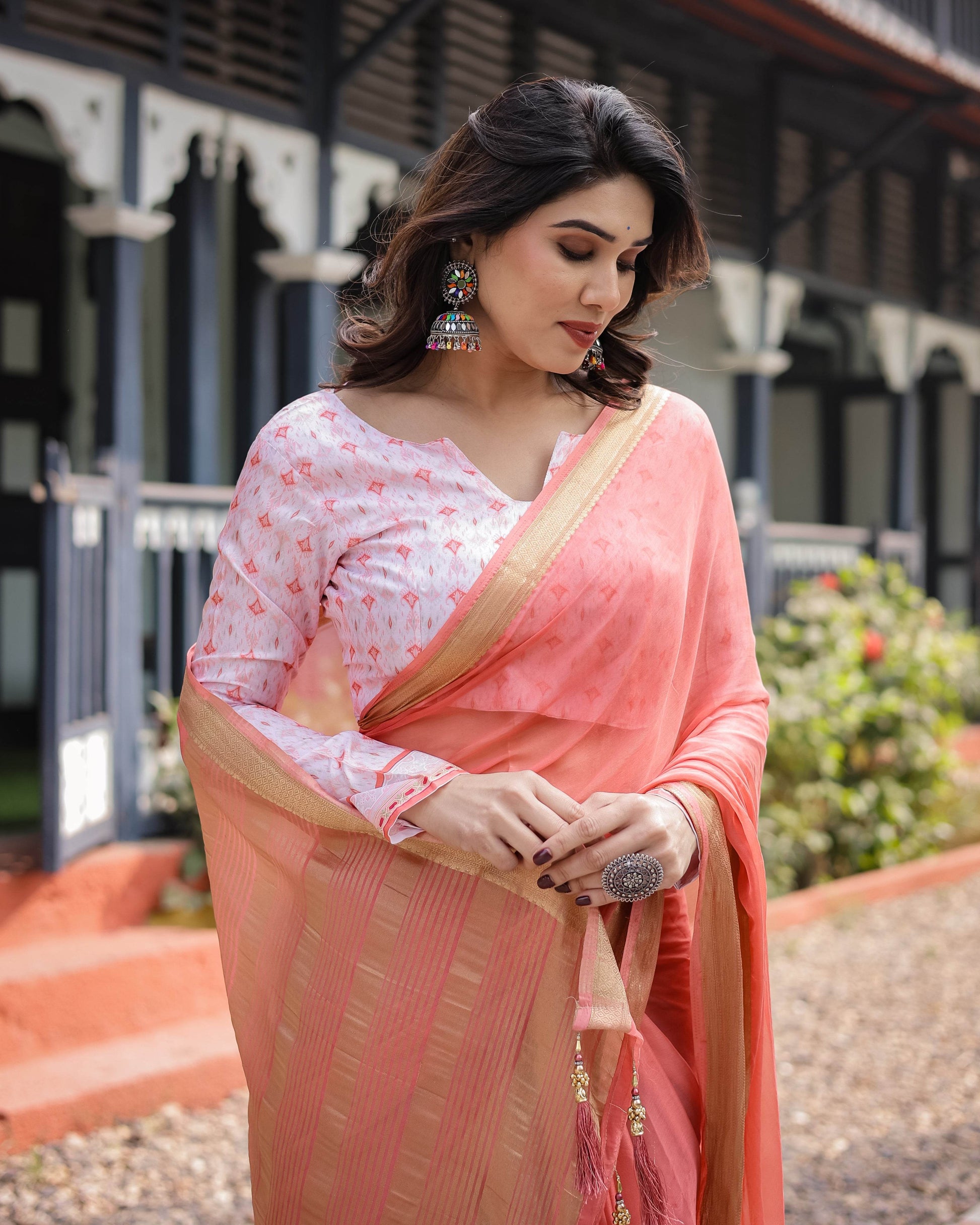 Peach Pink Plain Chiffon Saree with Gold Zari Border, Geometric Printed Blouse & Tassel Detailing - SEEANS