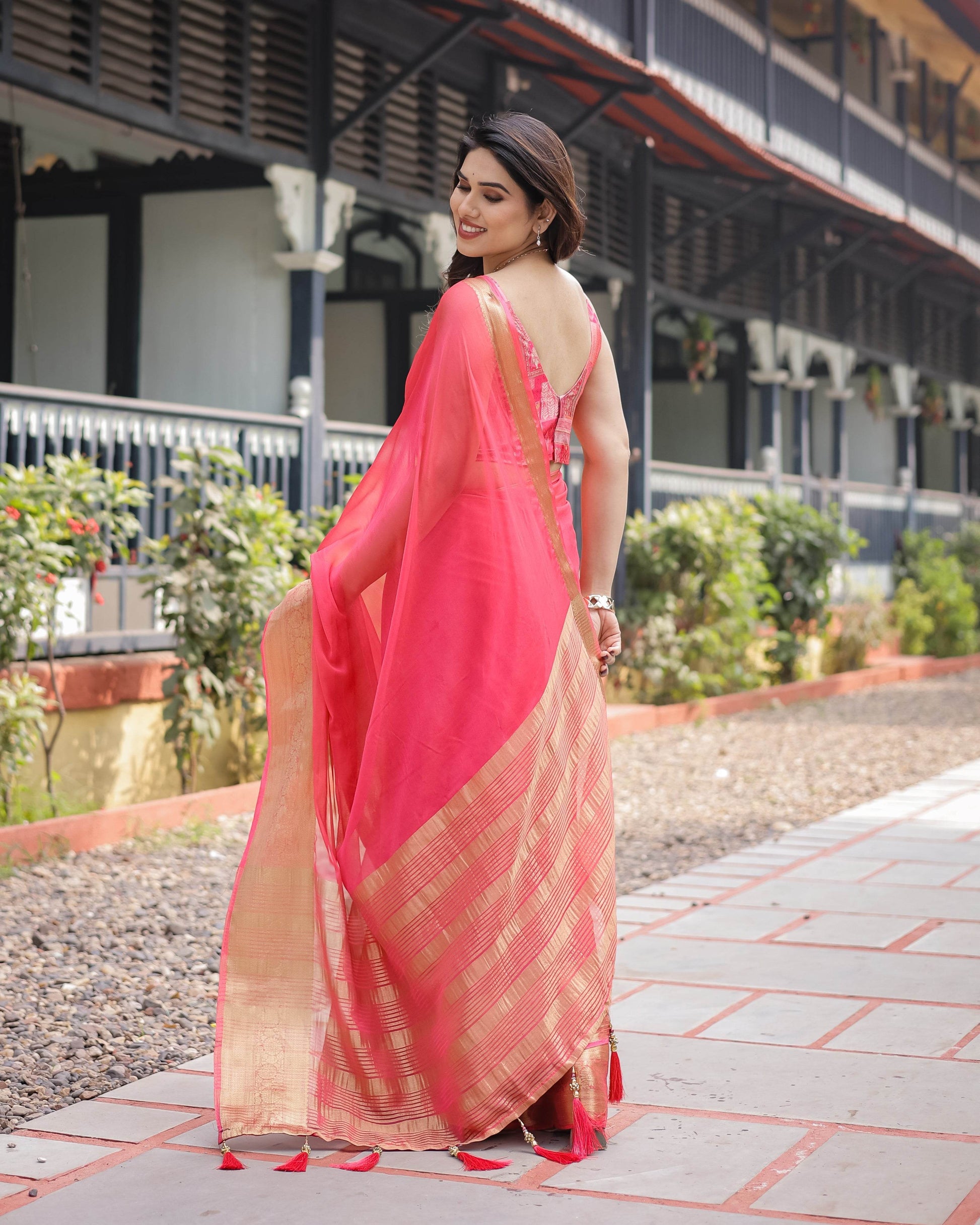 Flamingo Pink Plain Chiffon Saree with Gold Zari Border, Patterned Blouse & Tassel Detailing - SEEANS