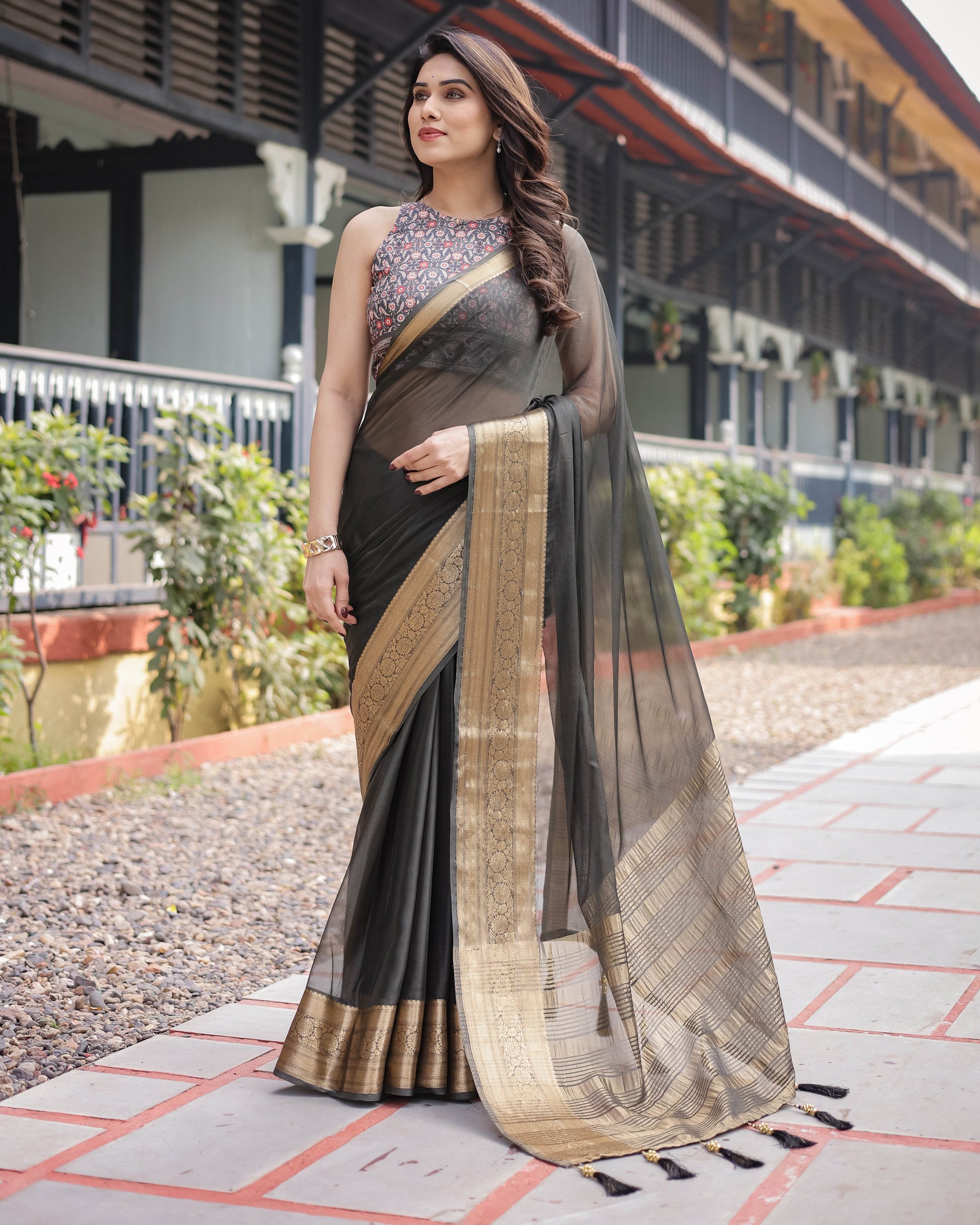 Ethereal Black Plain Chiffon Saree with Gold Zari Border, Floral Printed Blouse & Tassel Detailing - SEEANS