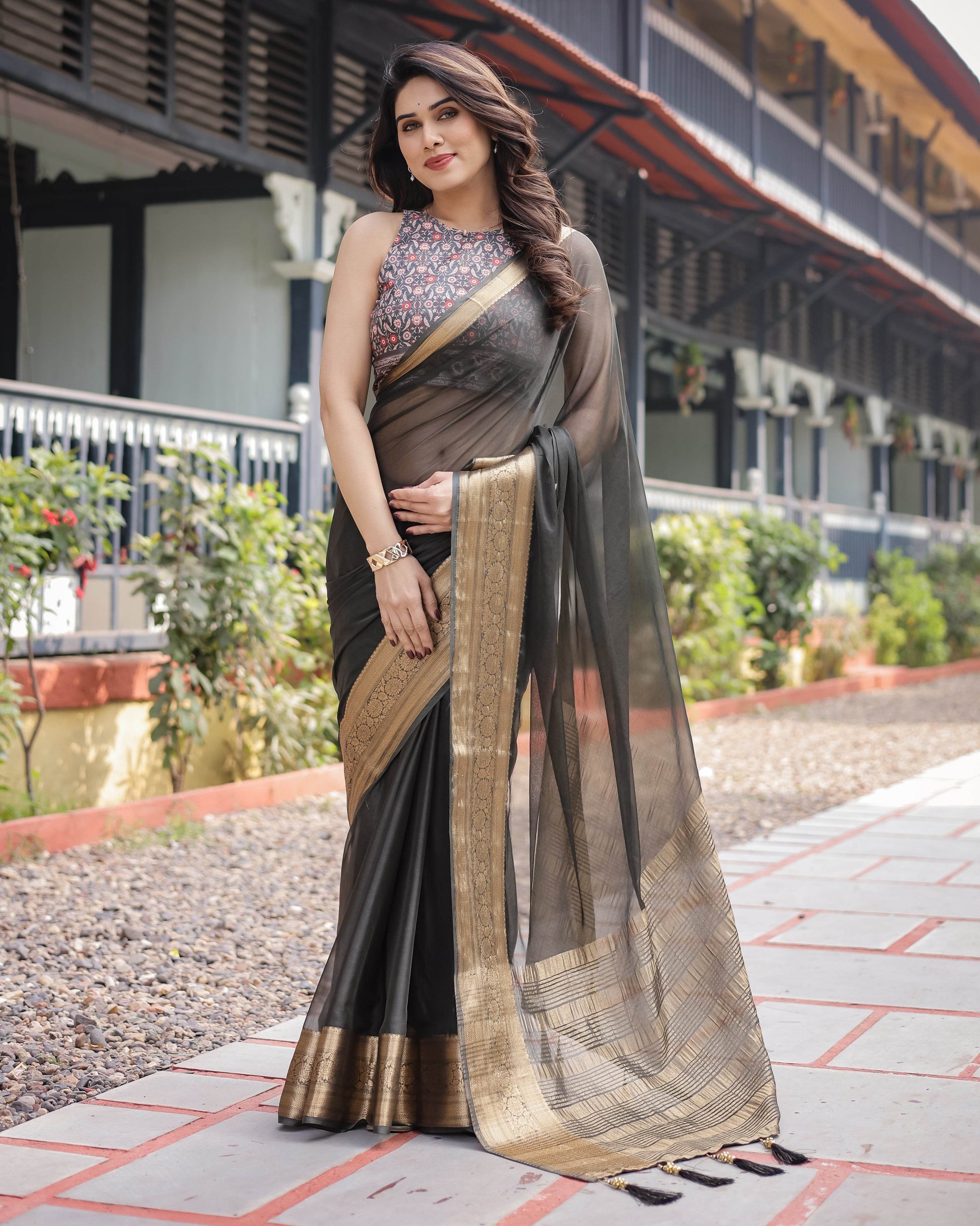 Ethereal Black Plain Chiffon Saree with Gold Zari Border, Floral Printed Blouse & Tassel Detailing - SEEANS