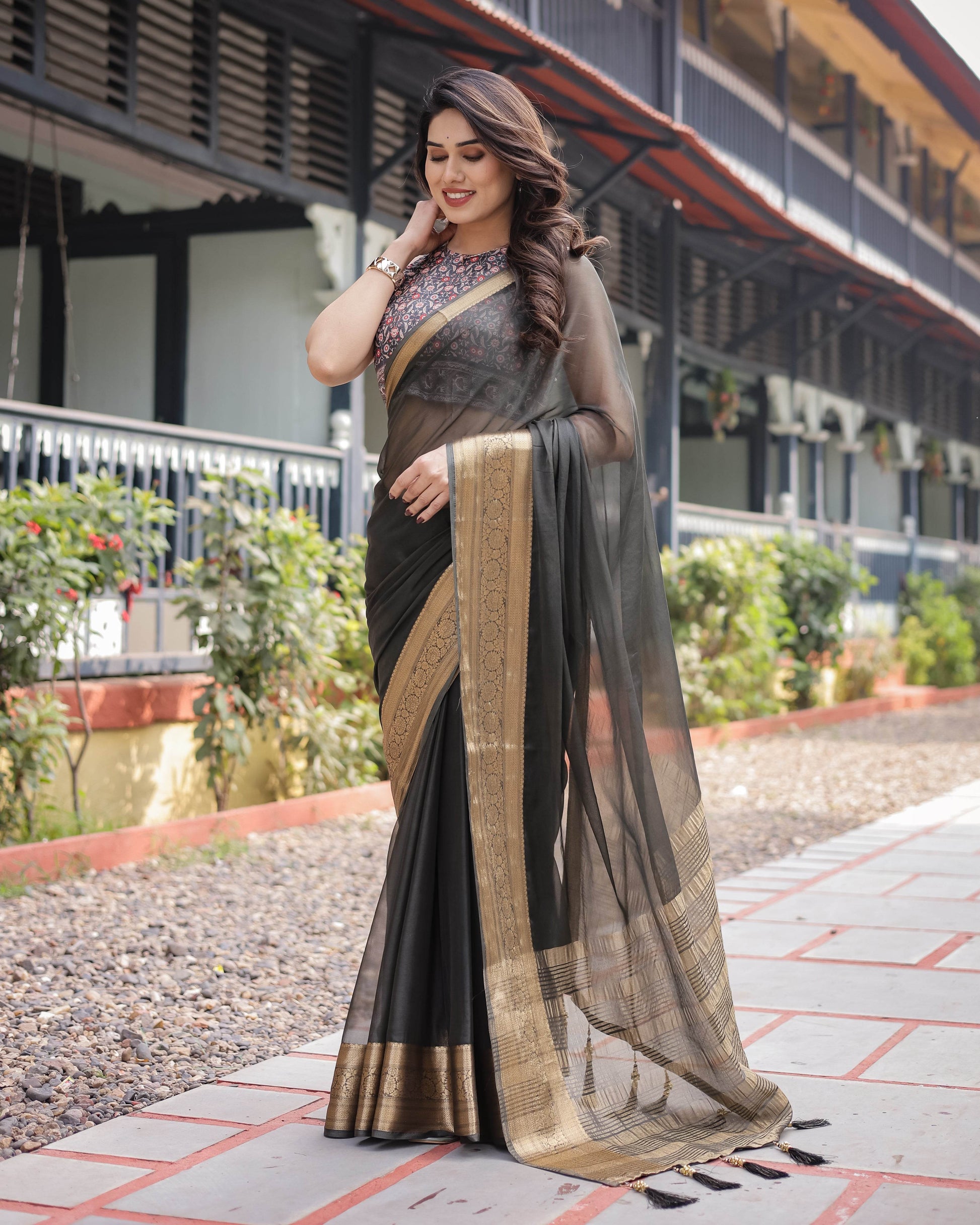 Ethereal Black Plain Chiffon Saree with Gold Zari Border, Floral Printed Blouse & Tassel Detailing - SEEANS