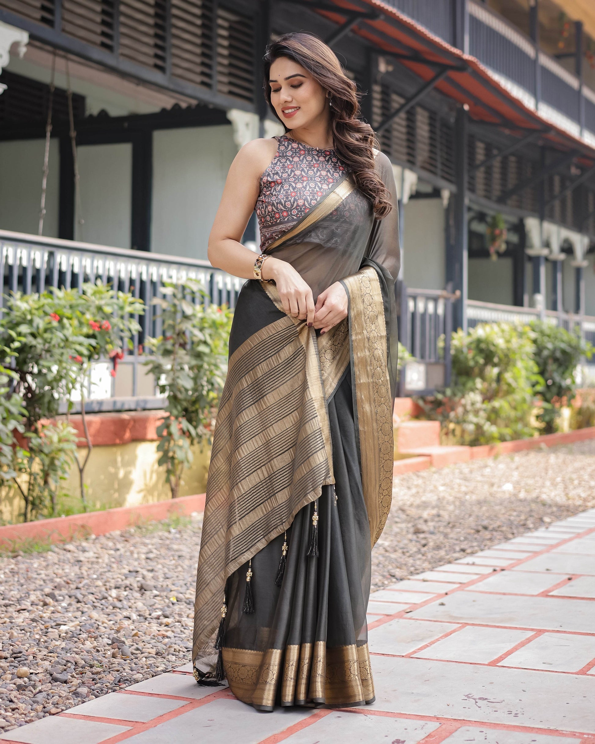 Ethereal Black Plain Chiffon Saree with Gold Zari Border, Floral Printed Blouse & Tassel Detailing - SEEANS