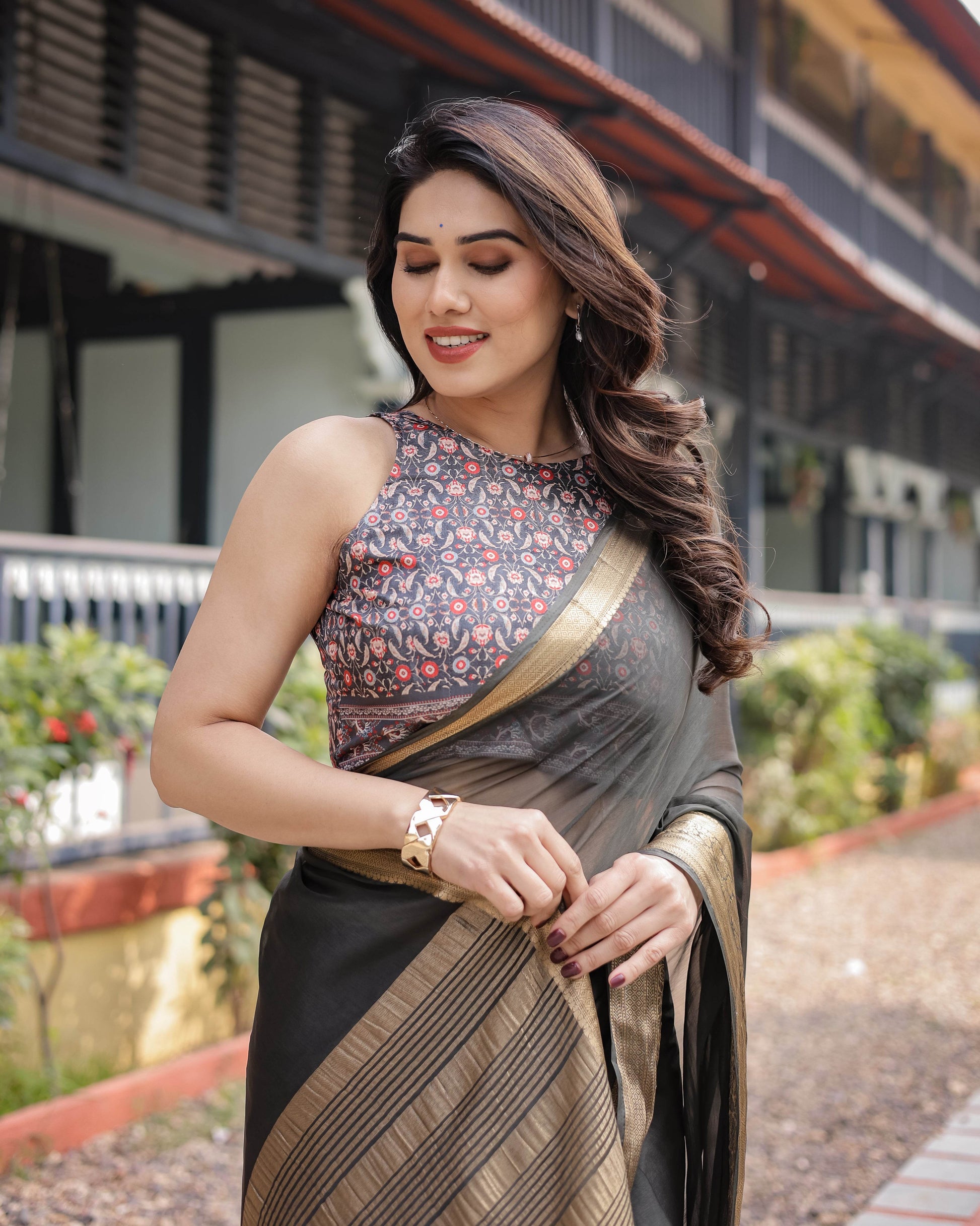 Ethereal Black Plain Chiffon Saree with Gold Zari Border, Floral Printed Blouse & Tassel Detailing - SEEANS