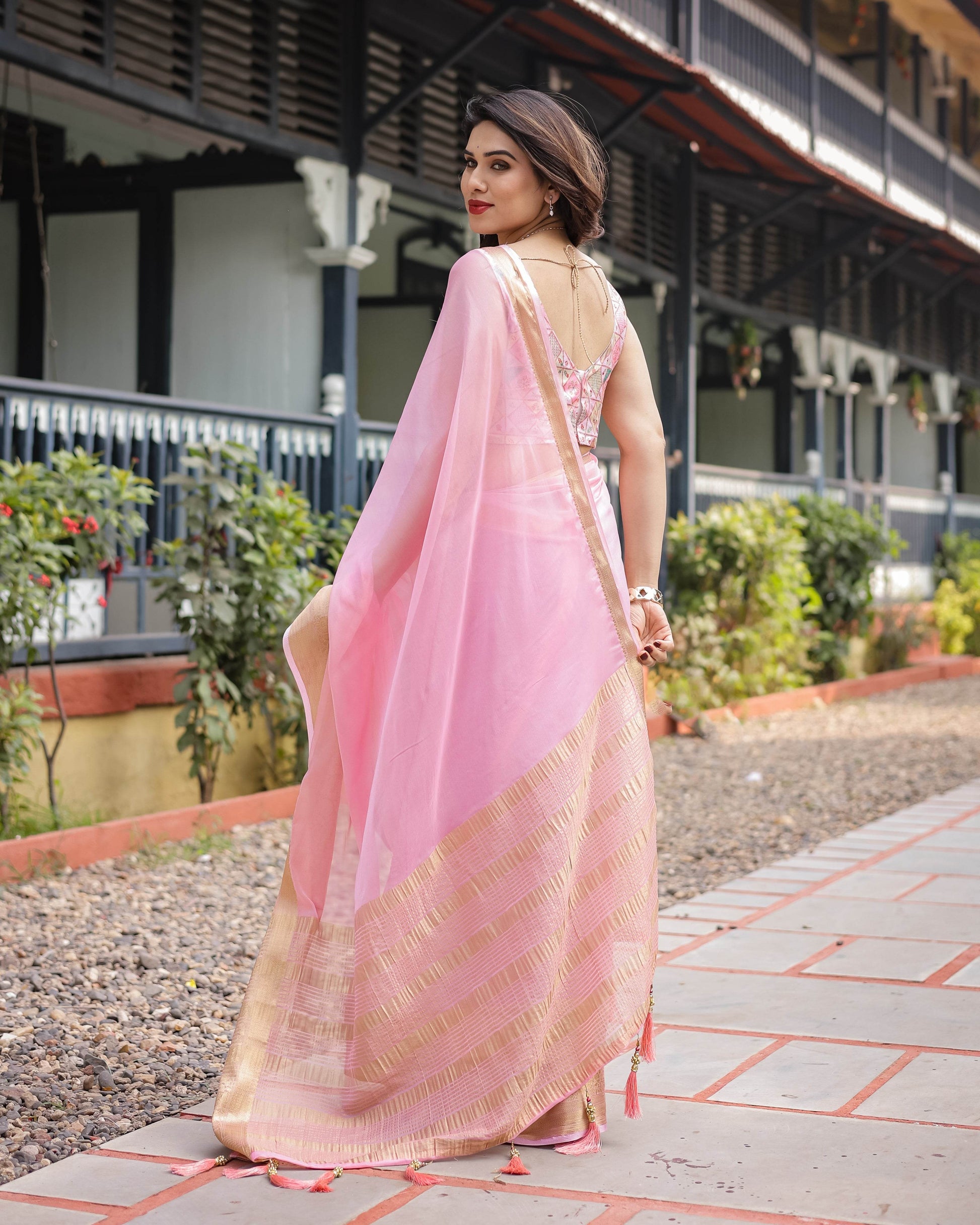 Soft Baby Pink Plain Chiffon Saree with Gold Zari Border, Geometric Embroidered Blouse & Tassel Detailing - SEEANS