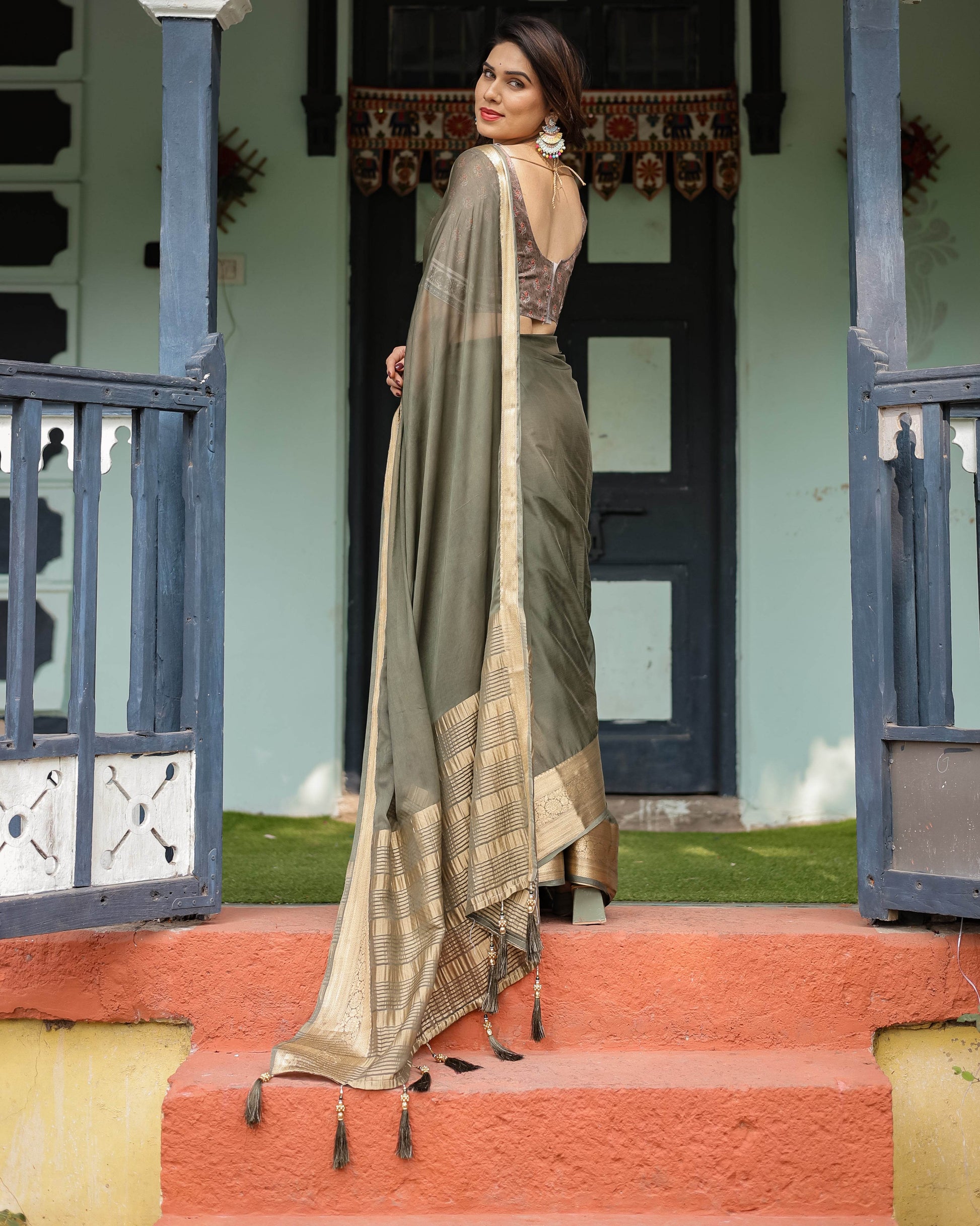 Elegant Olive Green Plain Chiffon Saree with Gold Zari Border, Floral Printed Blouse & Tassel Detailing - SEEANS