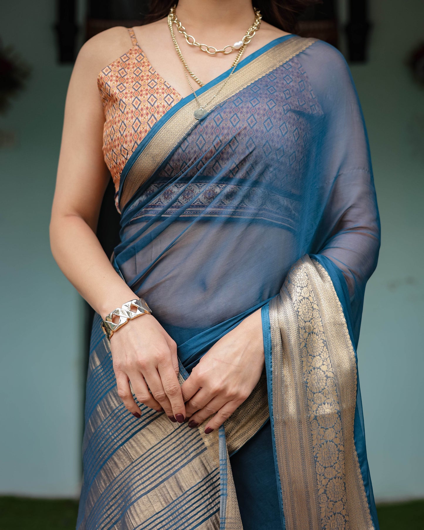 Teal Blue Plain Chiffon Saree with Gold Zari Border, Geometric Printed Blouse & Tassel Detailing - SEEANS