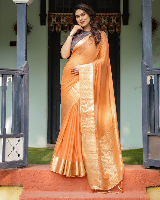 Elegant Tangerine Orange Plain Chiffon Saree with Gold Zari Border, Geometric Printed Blouse & Tassel Detailing - SEEANS