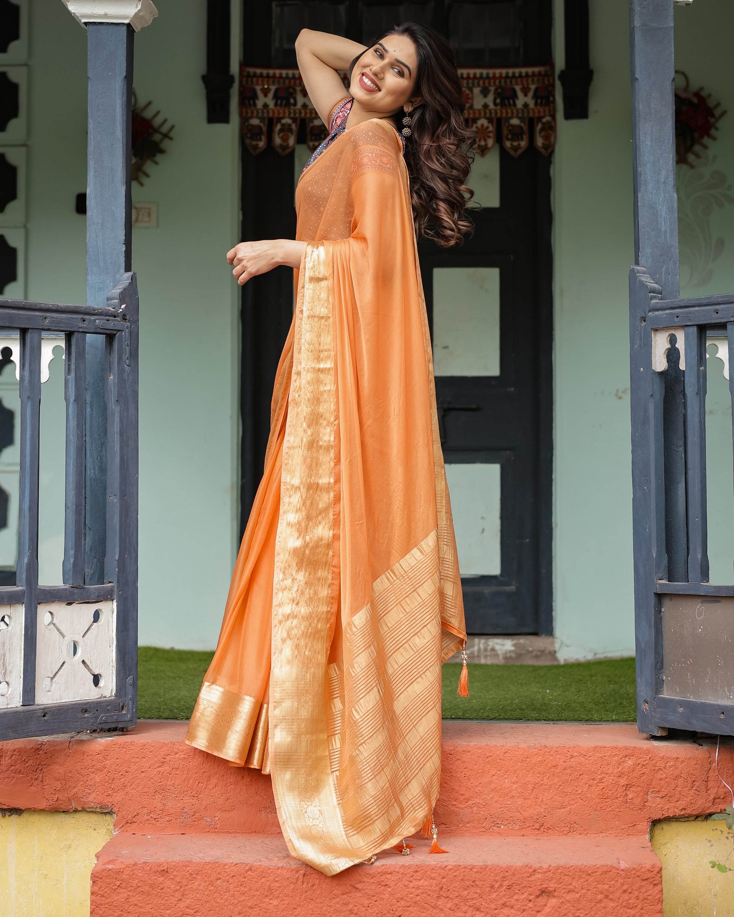 Elegant Tangerine Orange Plain Chiffon Saree with Gold Zari Border, Geometric Printed Blouse & Tassel Detailing - SEEANS