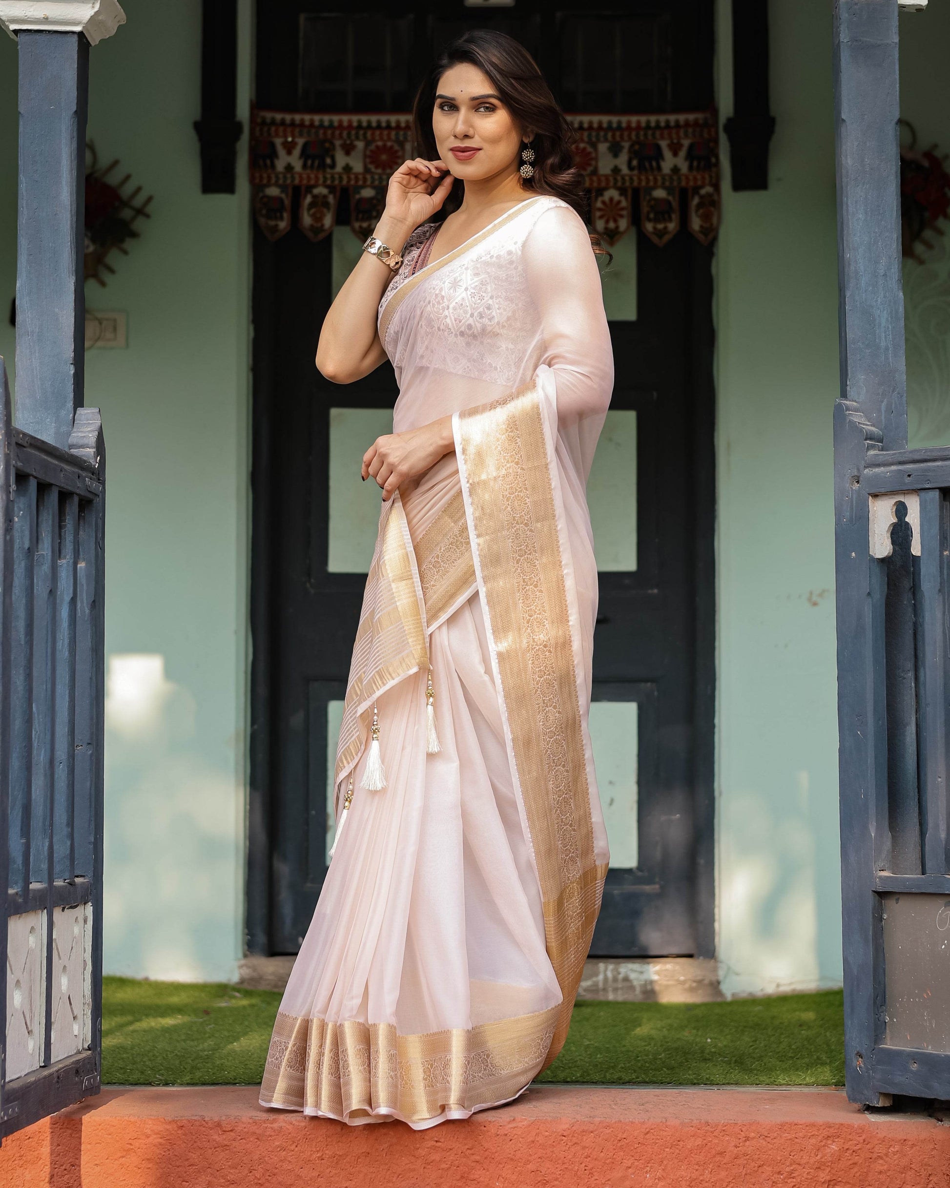 Ethereal Off-White Plain Chiffon Saree with Gold Zari Border, Intricate Floral Printed Blouse & Tassel Detailing - SEEANS