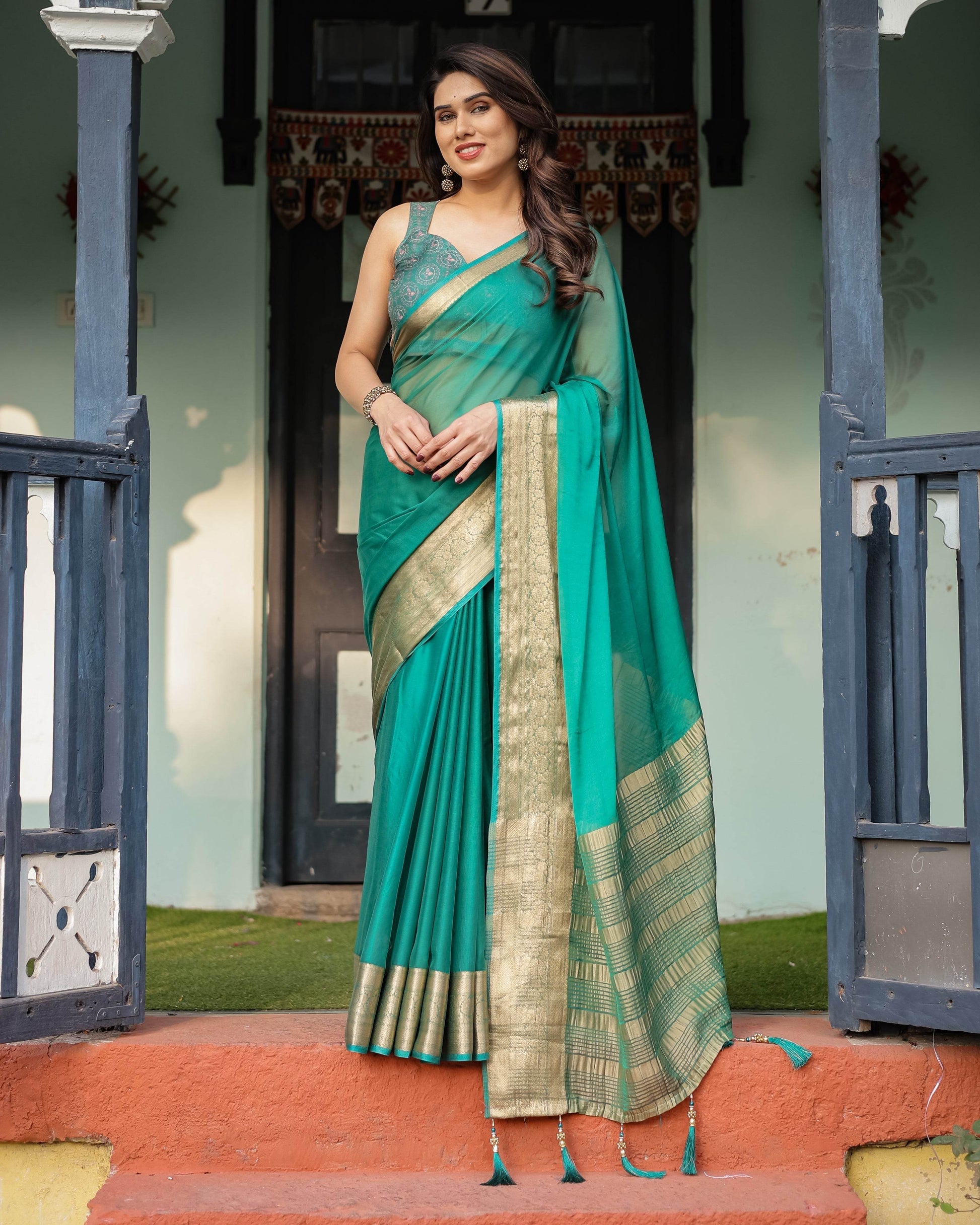 Elegant Sea Green Plain Chiffon Saree with Gold Zari Border, Paisley Printed Blouse & Tassel Detailing - SEEANS