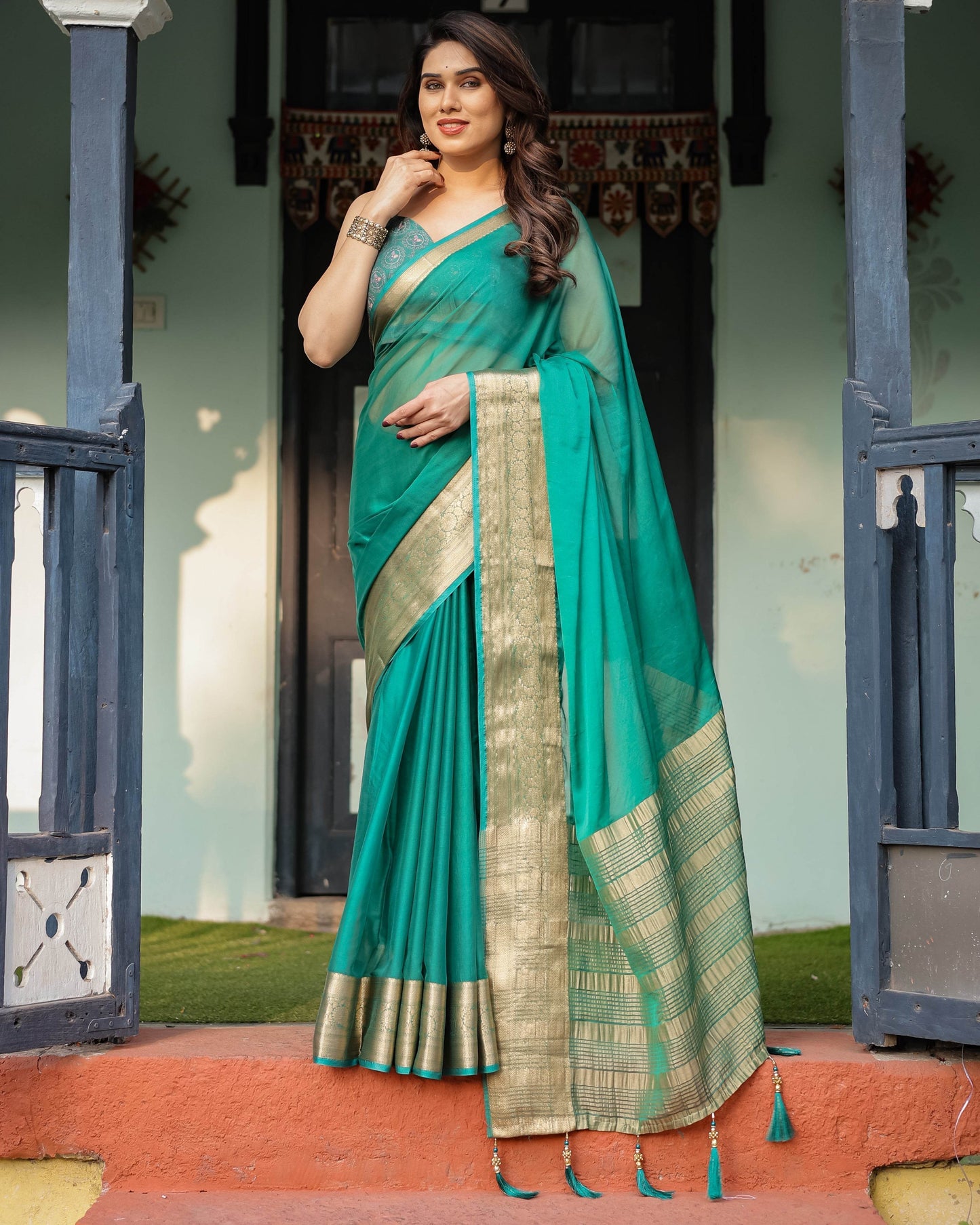 Elegant Sea Green Plain Chiffon Saree with Gold Zari Border, Paisley Printed Blouse & Tassel Detailing - SEEANS