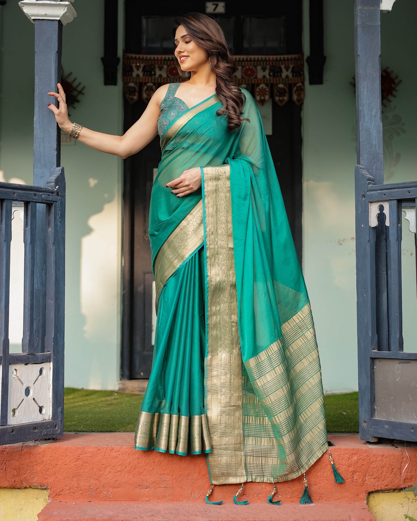 Elegant Sea Green Plain Chiffon Saree with Gold Zari Border, Paisley Printed Blouse & Tassel Detailing - SEEANS