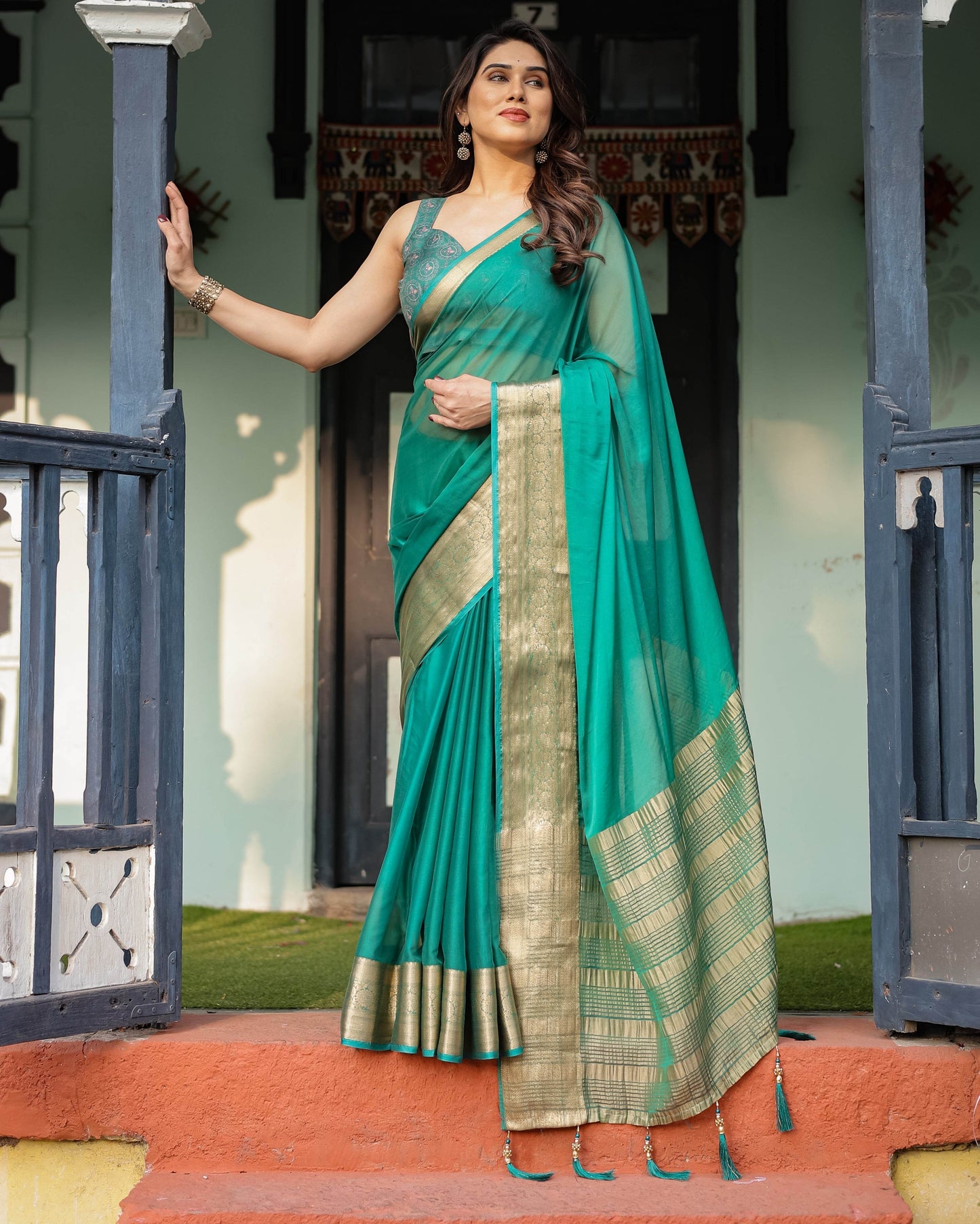 Elegant Sea Green Plain Chiffon Saree with Gold Zari Border, Paisley Printed Blouse & Tassel Detailing - SEEANS