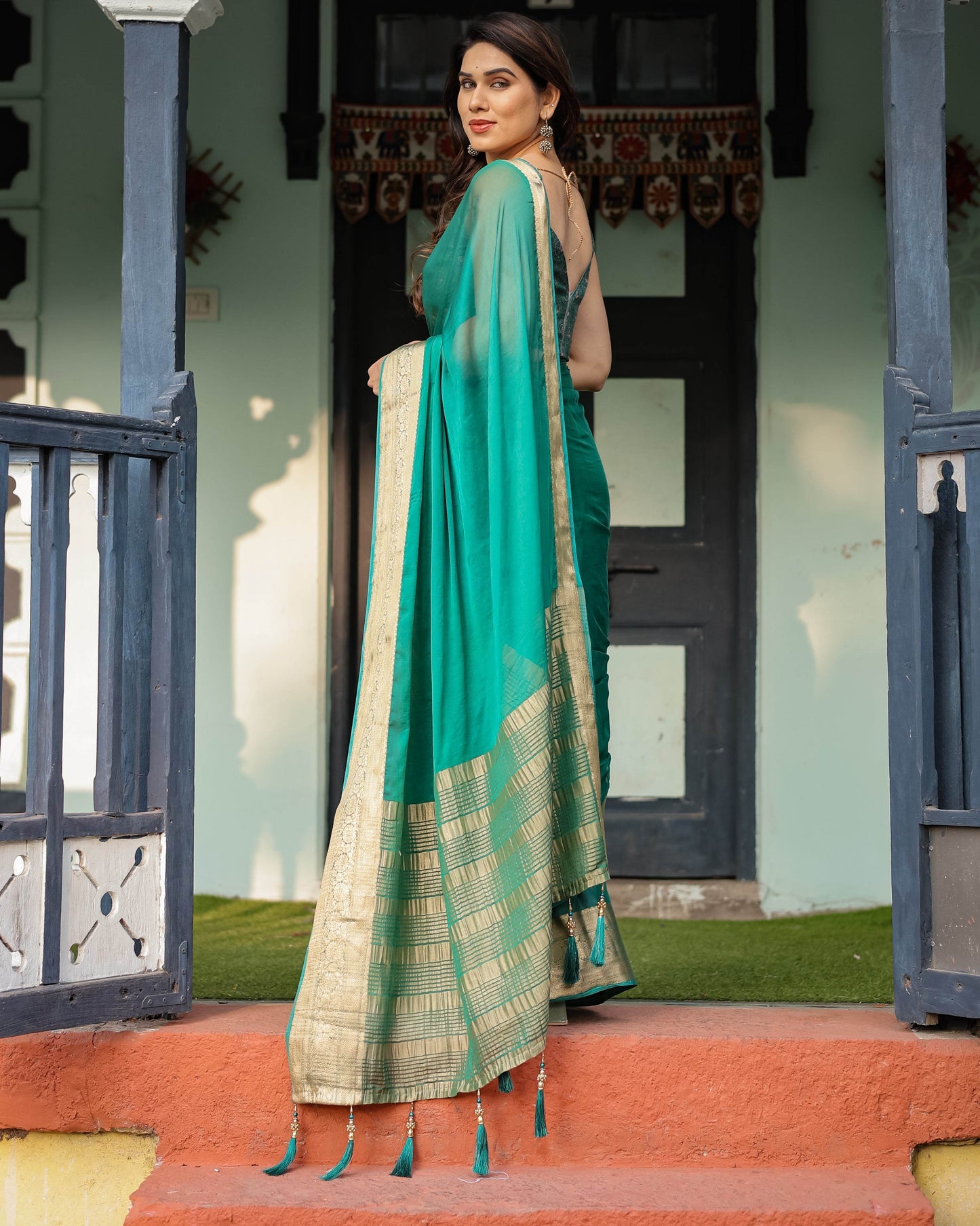 Elegant Sea Green Plain Chiffon Saree with Gold Zari Border, Paisley Printed Blouse & Tassel Detailing - SEEANS