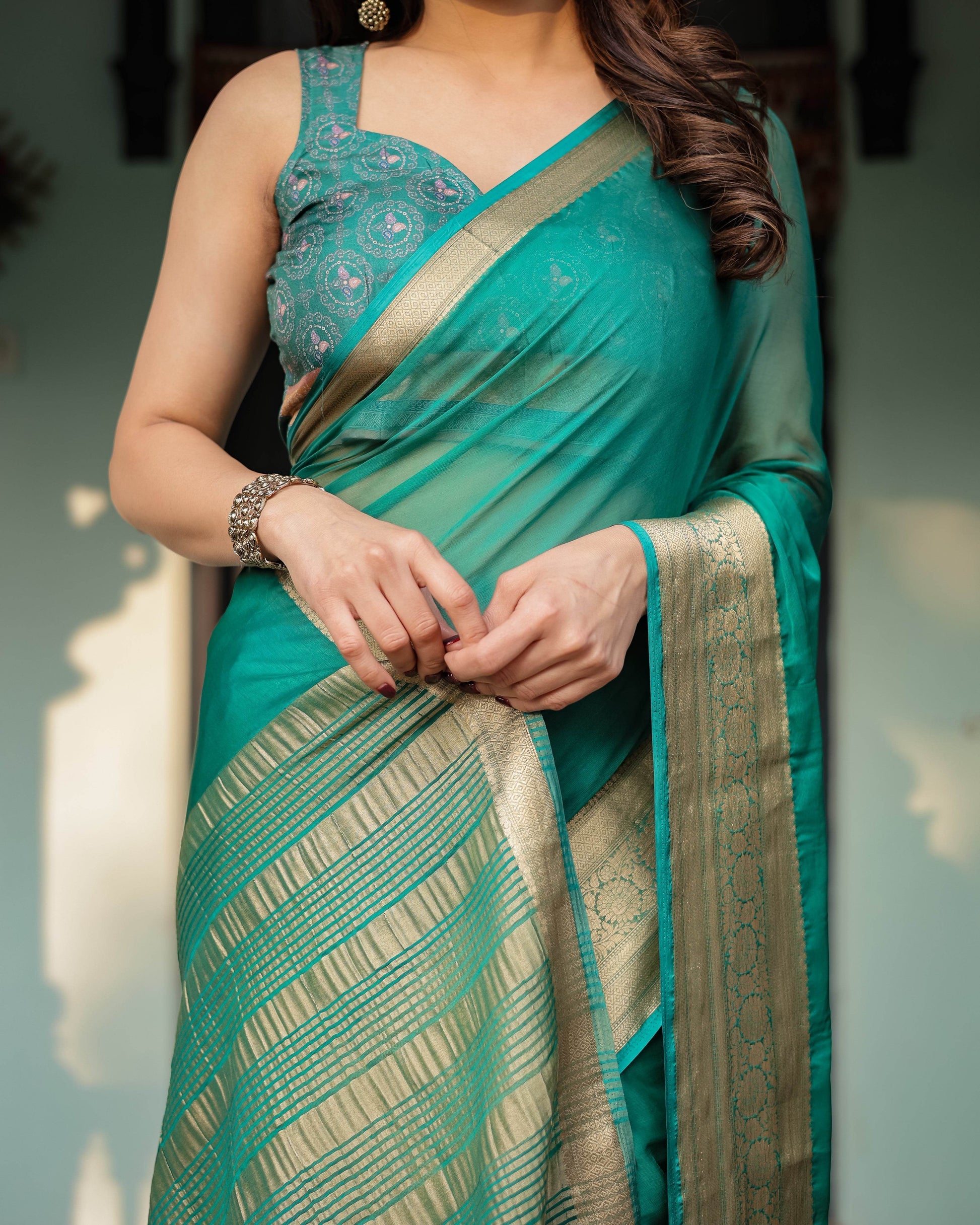 Elegant Sea Green Plain Chiffon Saree with Gold Zari Border, Paisley Printed Blouse & Tassel Detailing - SEEANS