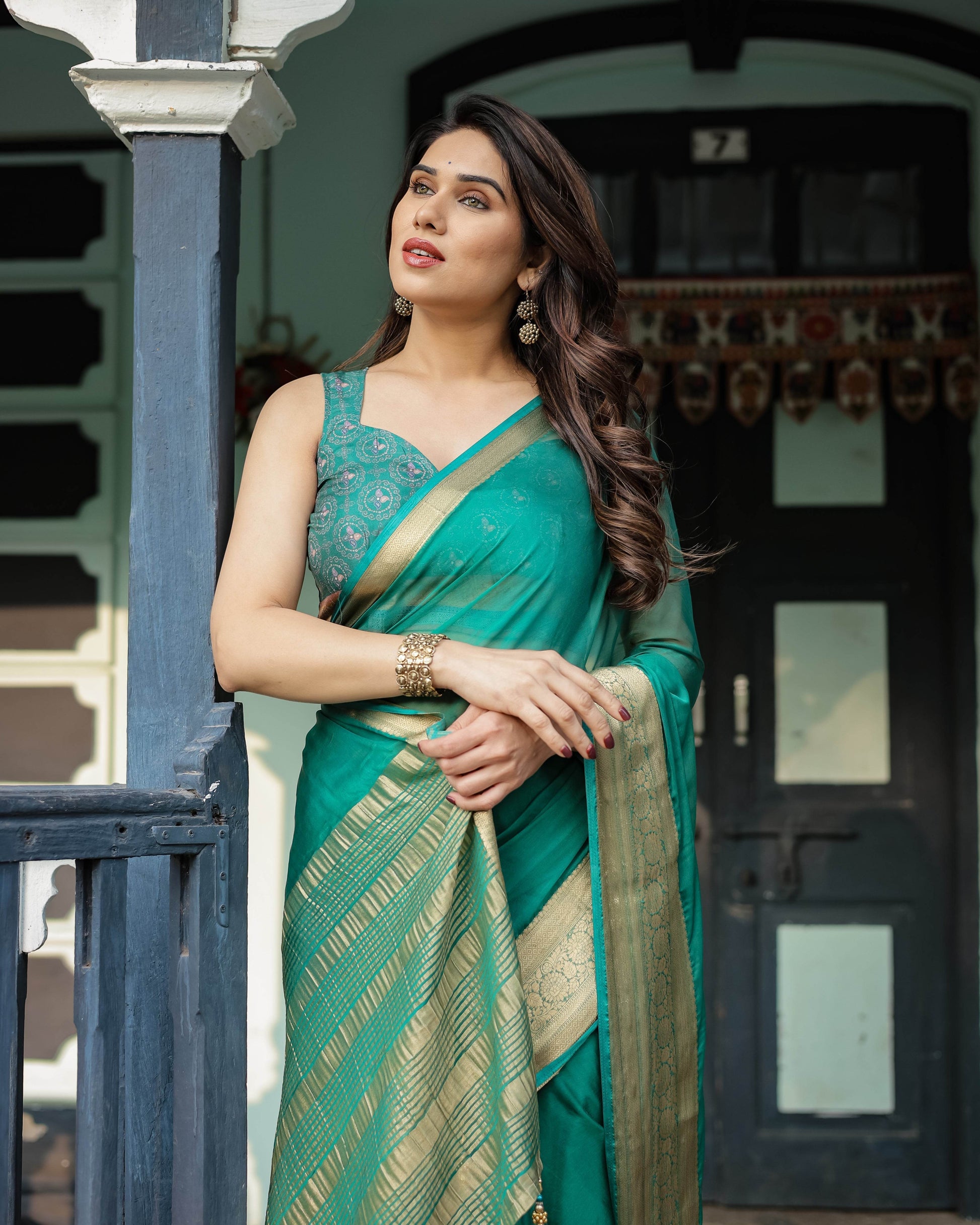 Elegant Sea Green Plain Chiffon Saree with Gold Zari Border, Paisley Printed Blouse & Tassel Detailing - SEEANS