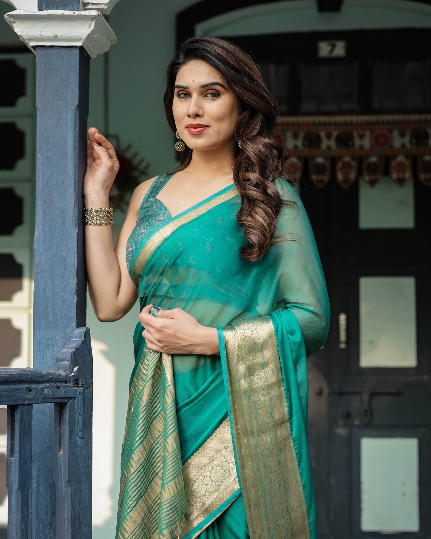 Elegant Sea Green Plain Chiffon Saree with Gold Zari Border, Paisley Printed Blouse & Tassel Detailing - SEEANS