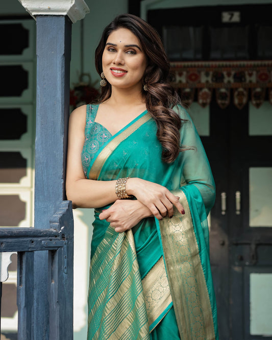 Elegant Sea Green Plain Chiffon Saree with Gold Zari Border, Paisley Printed Blouse & Tassel Detailing - SEEANS