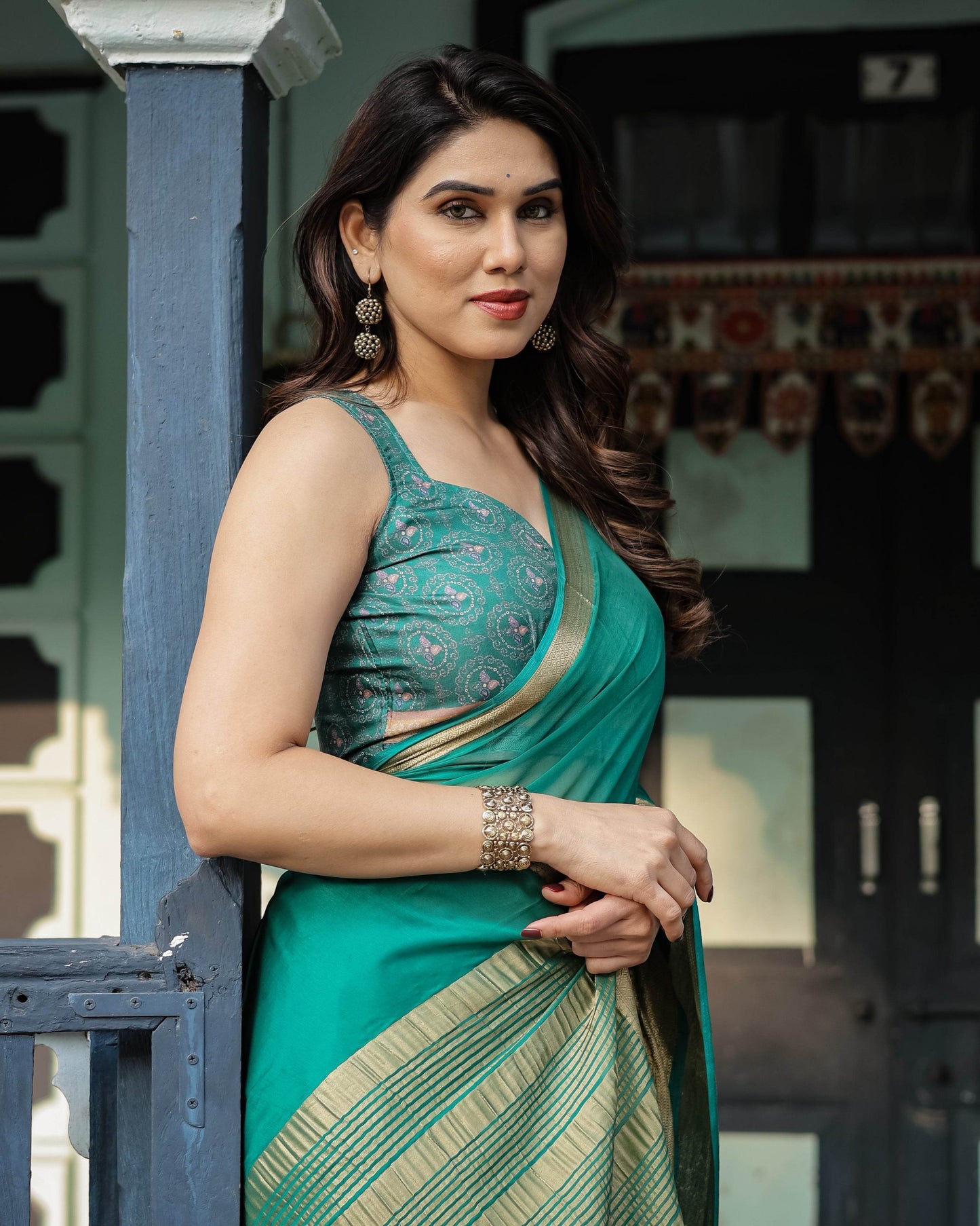 Elegant Sea Green Plain Chiffon Saree with Gold Zari Border, Paisley Printed Blouse & Tassel Detailing - SEEANS